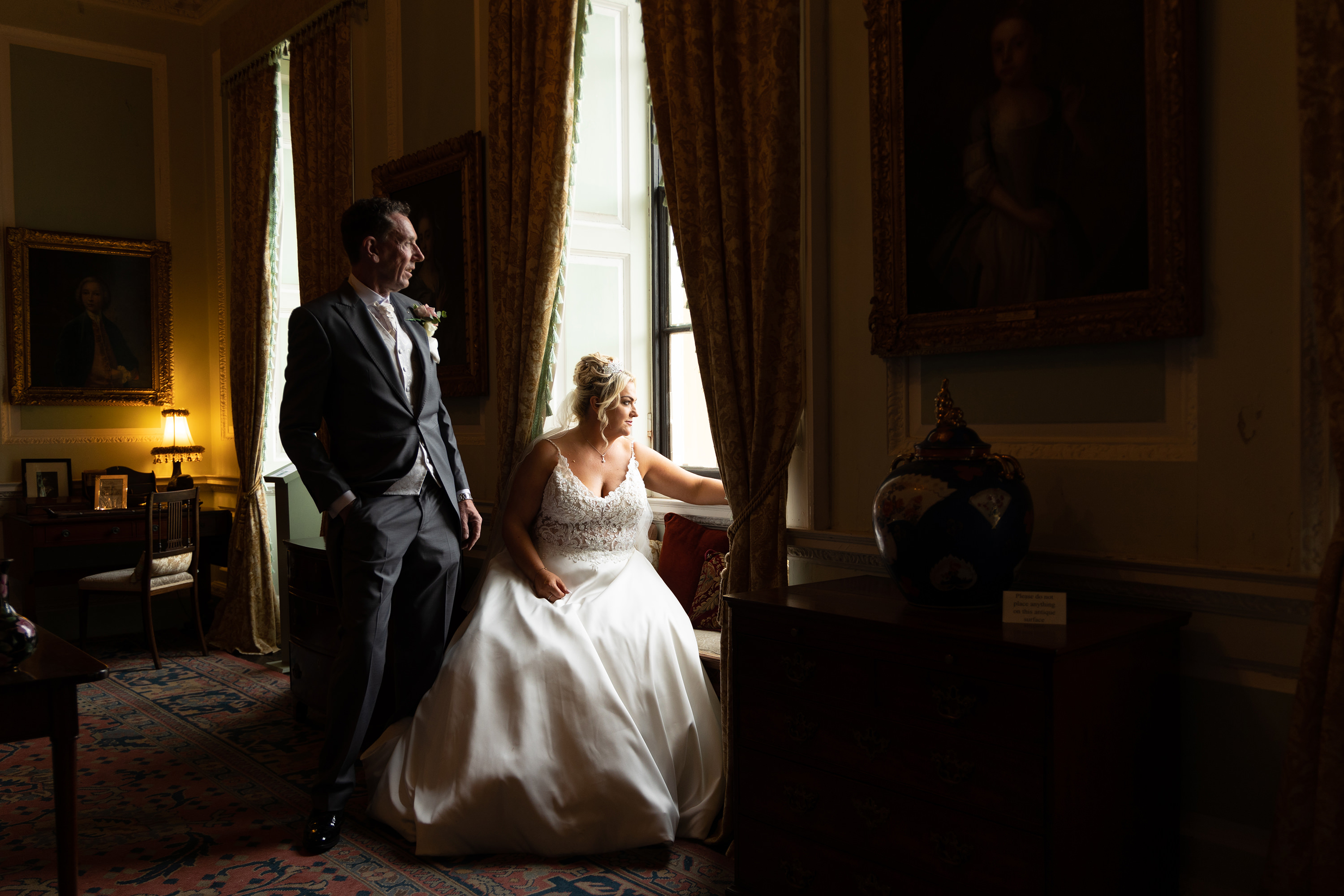 Amy & Tony pose for wedding photos inside Lytham Hall