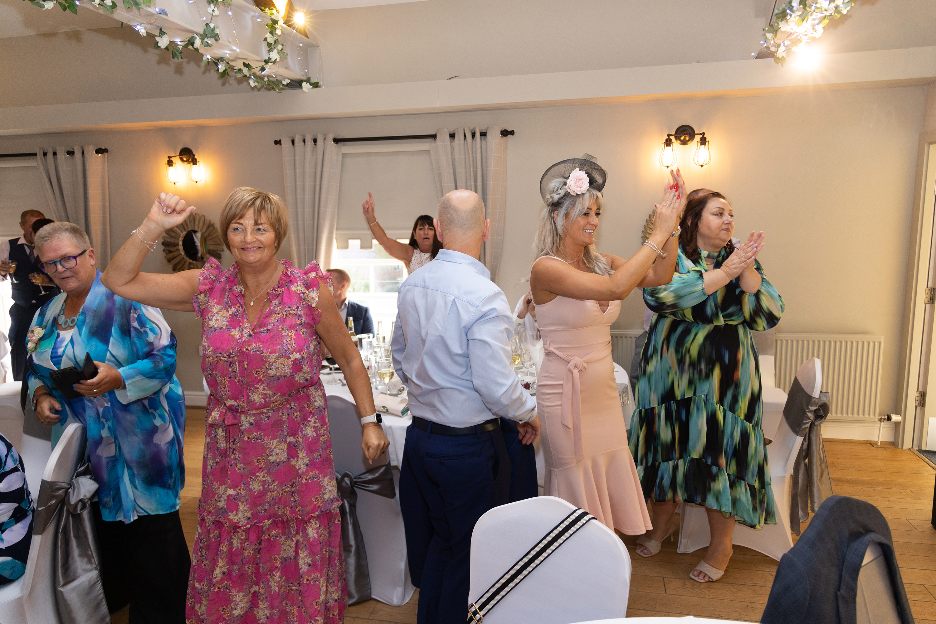 The wedding guests enjoying the party 