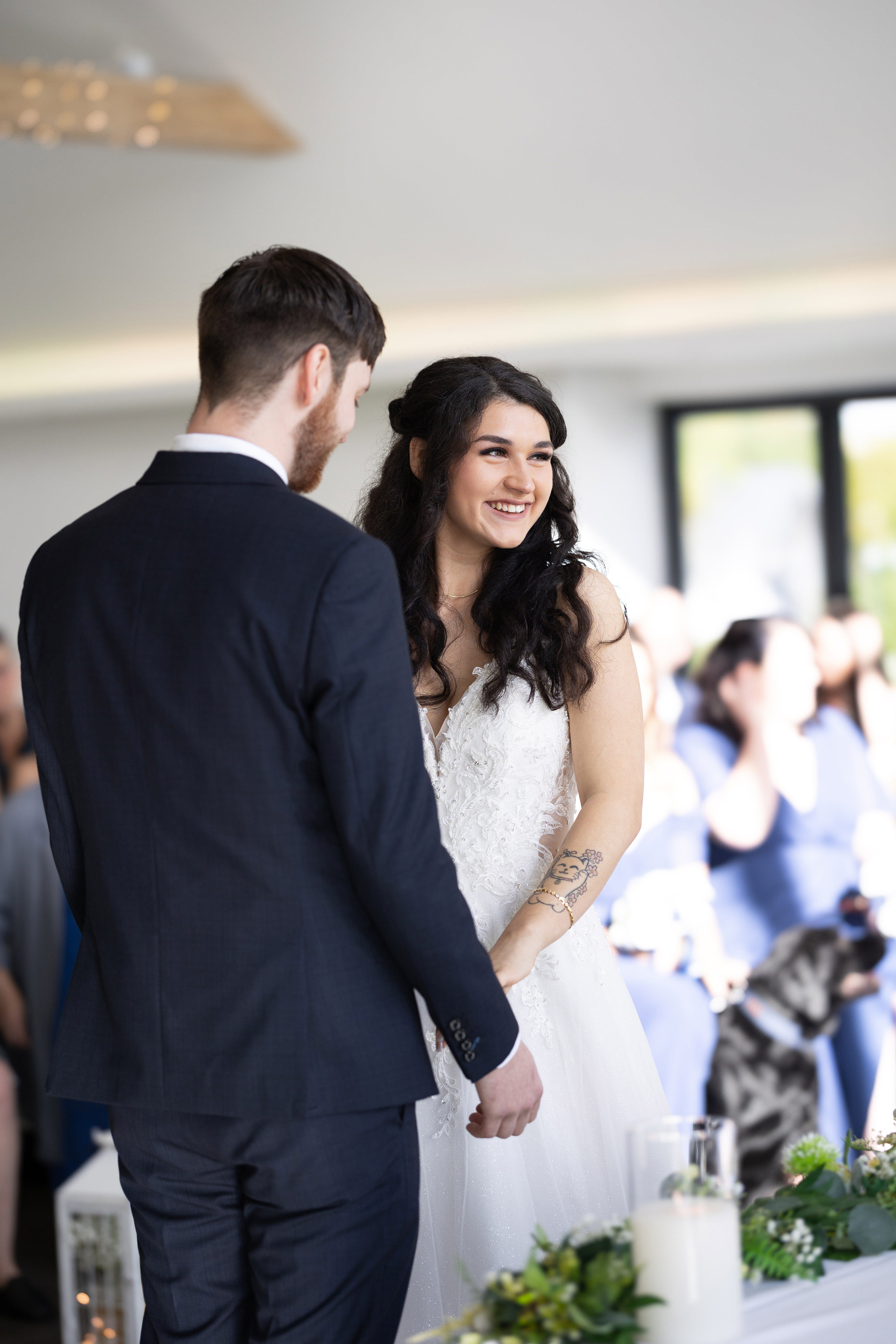 Emily and Neil exchange their wedding vows
