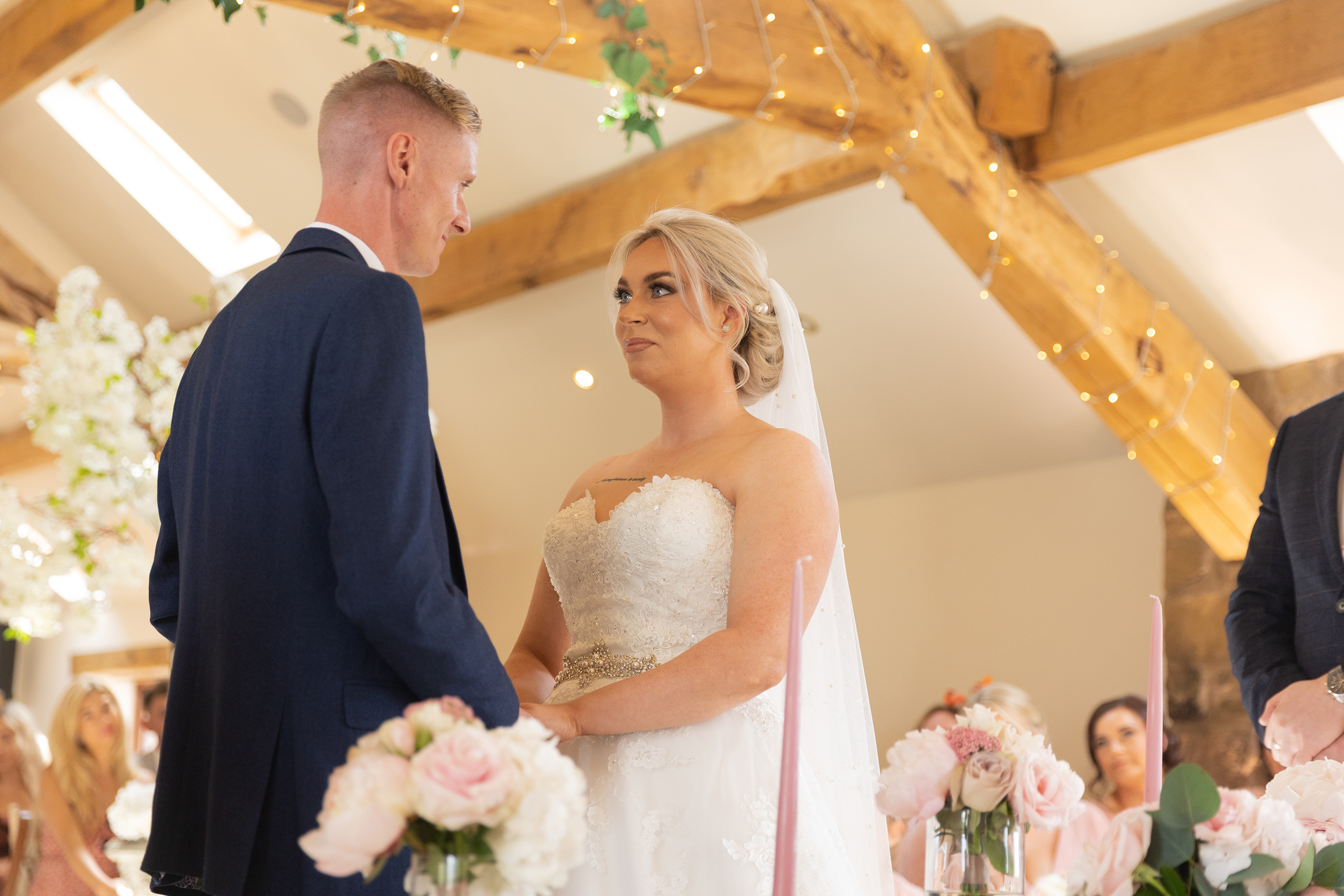 The bride and groom exchange their wedding vows