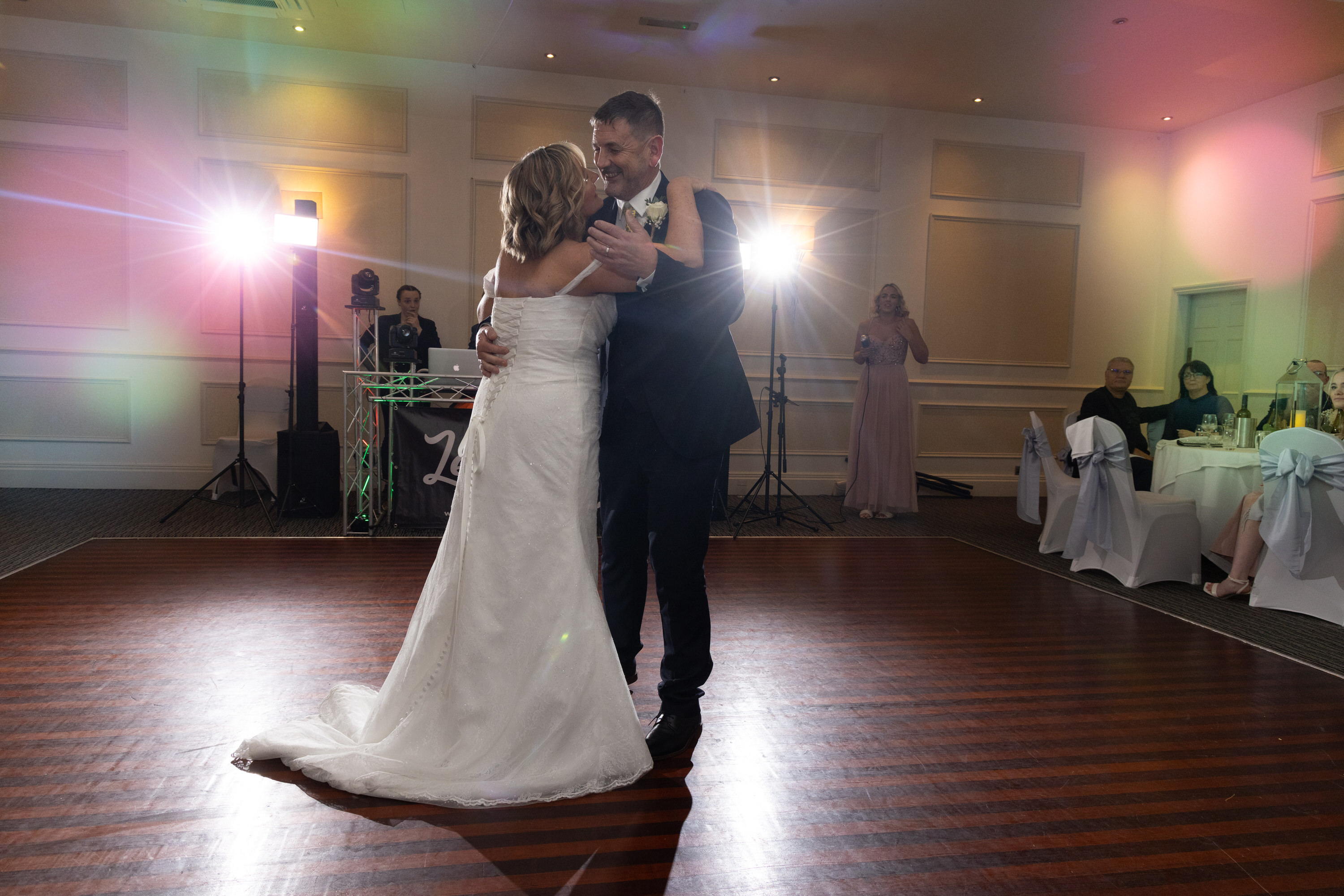 The bride and groom in joy their first dance