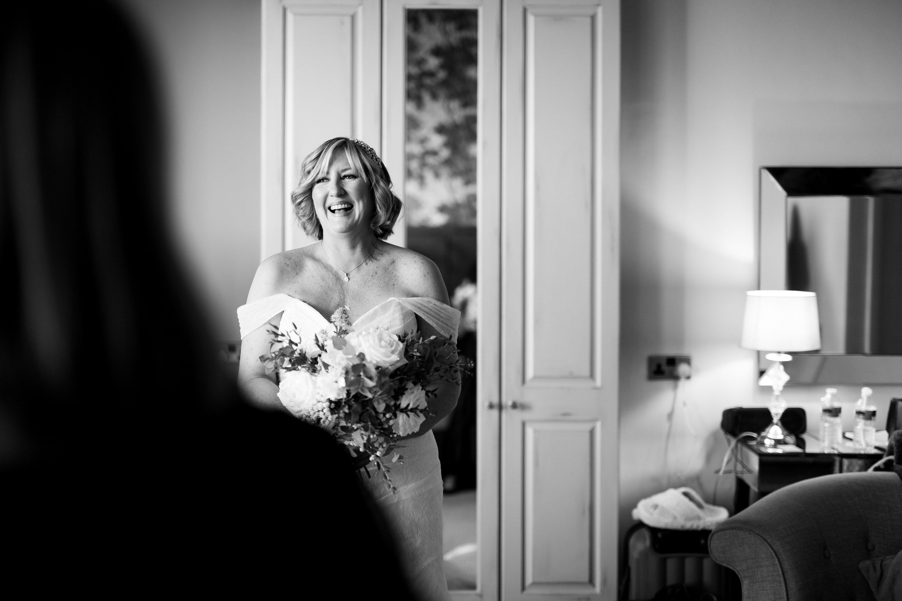 The Bride laughing with her friends before her wedding day 