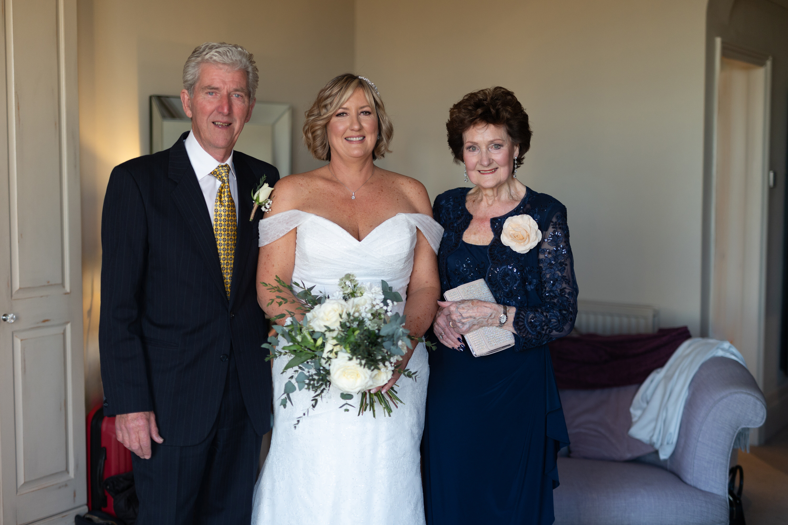 The bride with her parents 