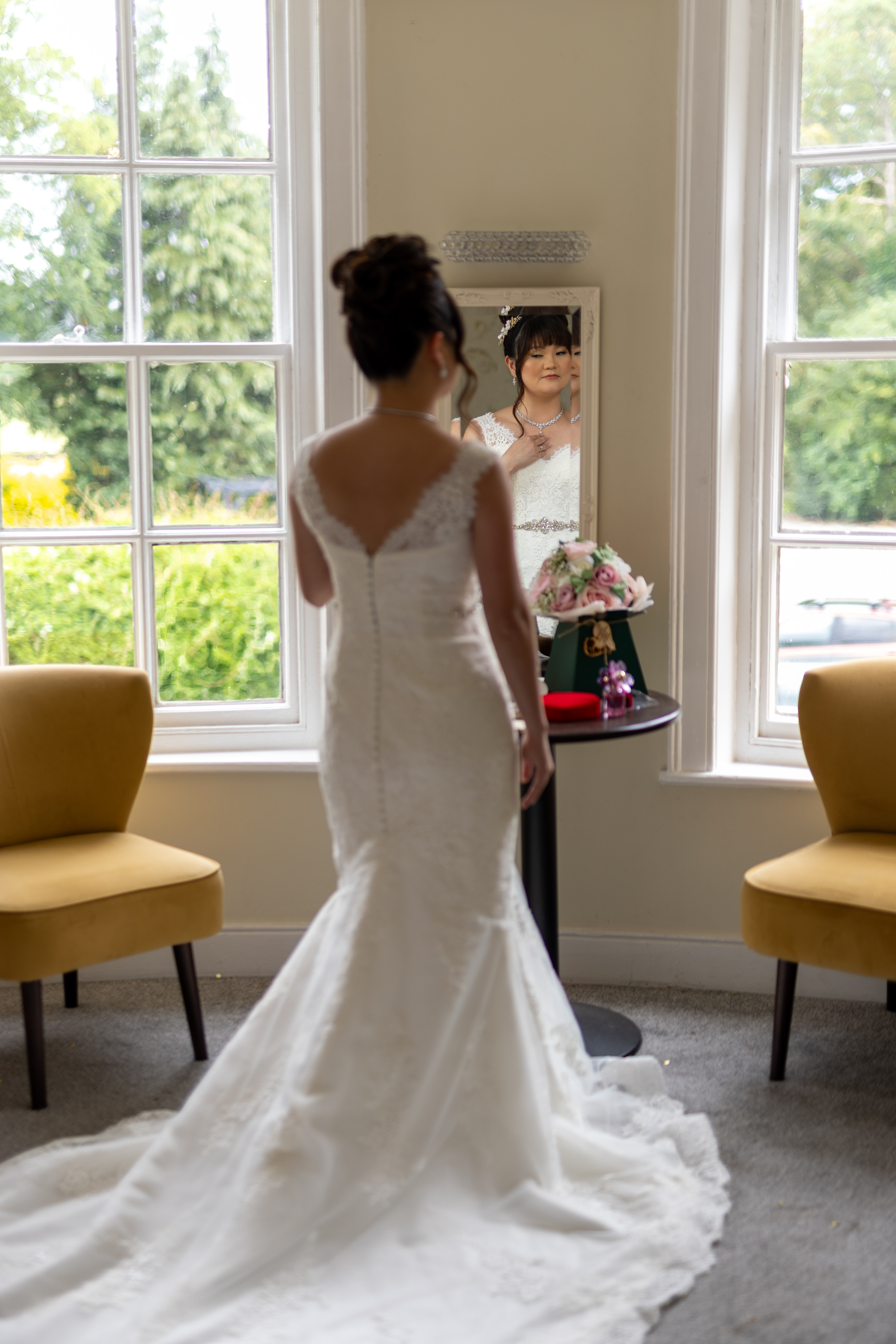 The Bride looking in the mirror 