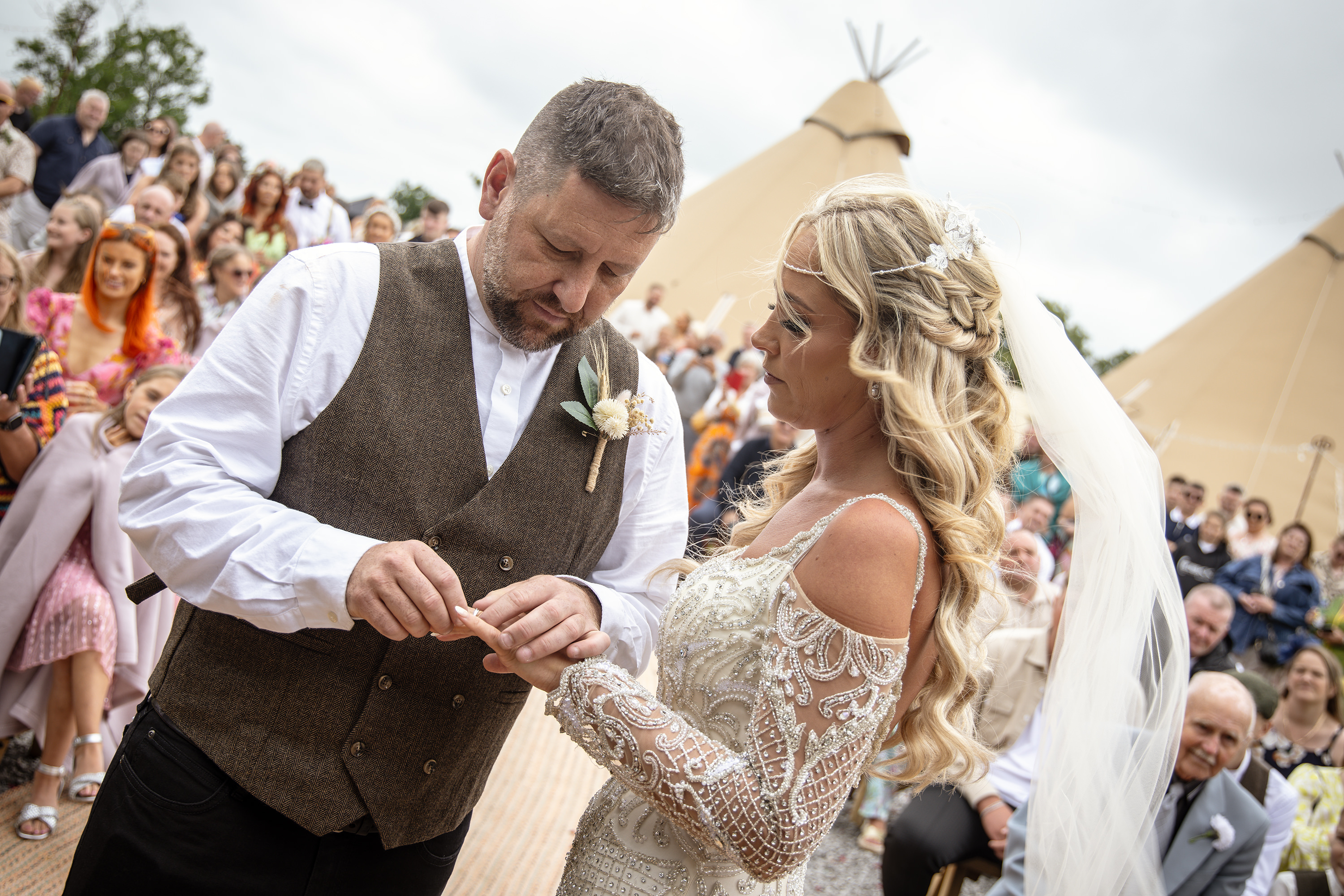 The bride and groom exchanged their wedding rings 