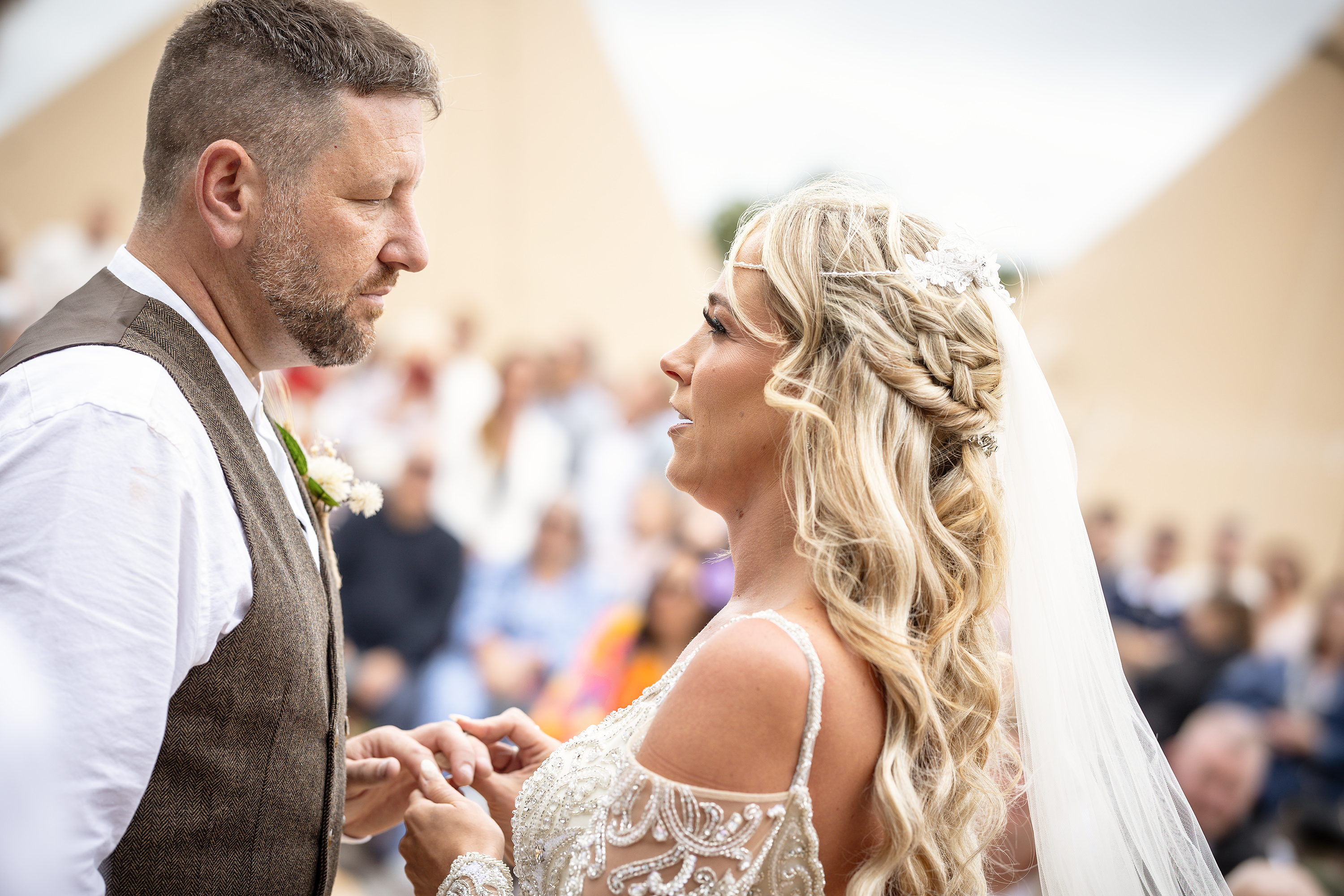 Samantha puts Daley's wedding ring on his finger