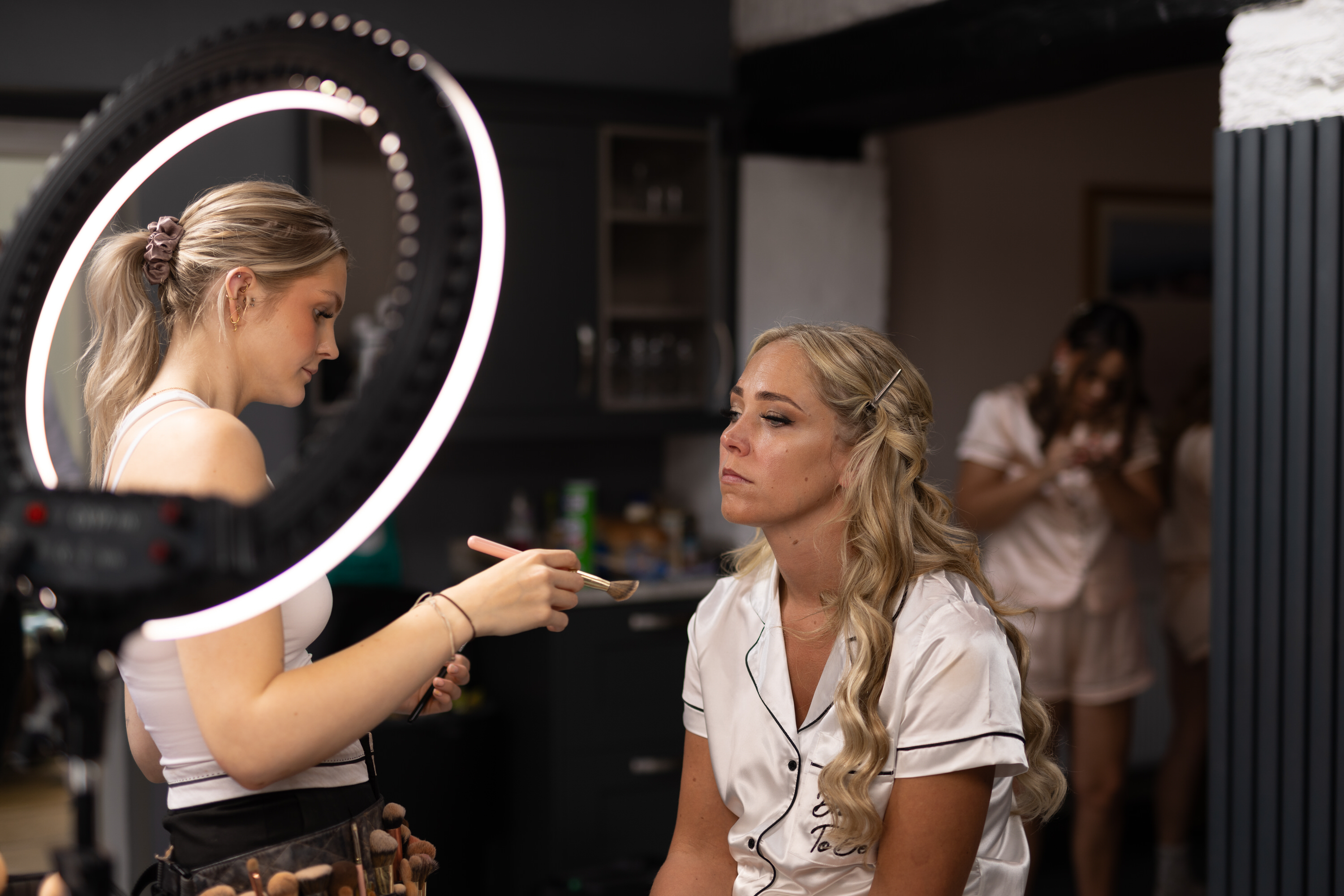 Samantha having her final makeup put on 