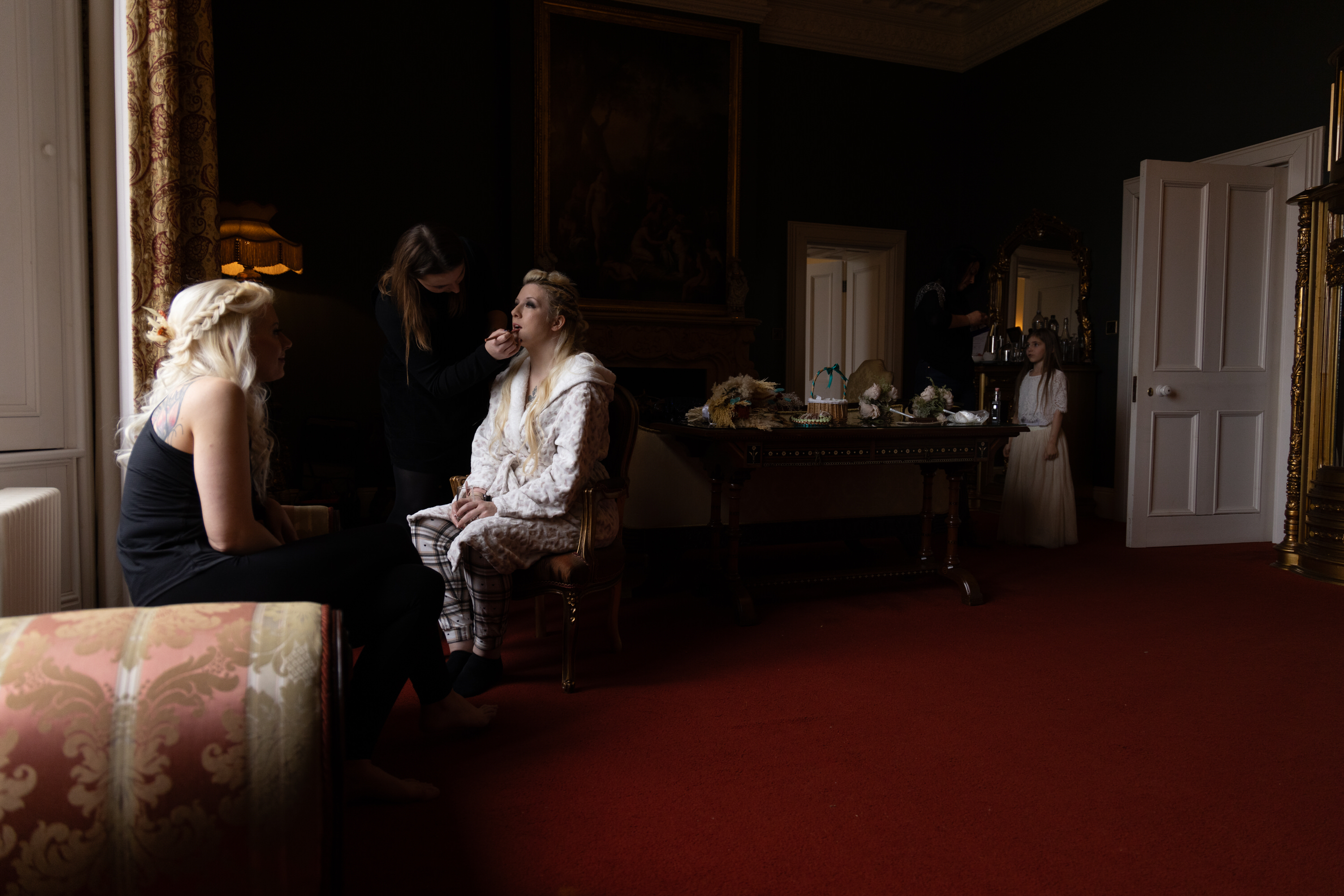 Shandi the Bride having her makeup put on in the bridal suite at Allerton Castle 