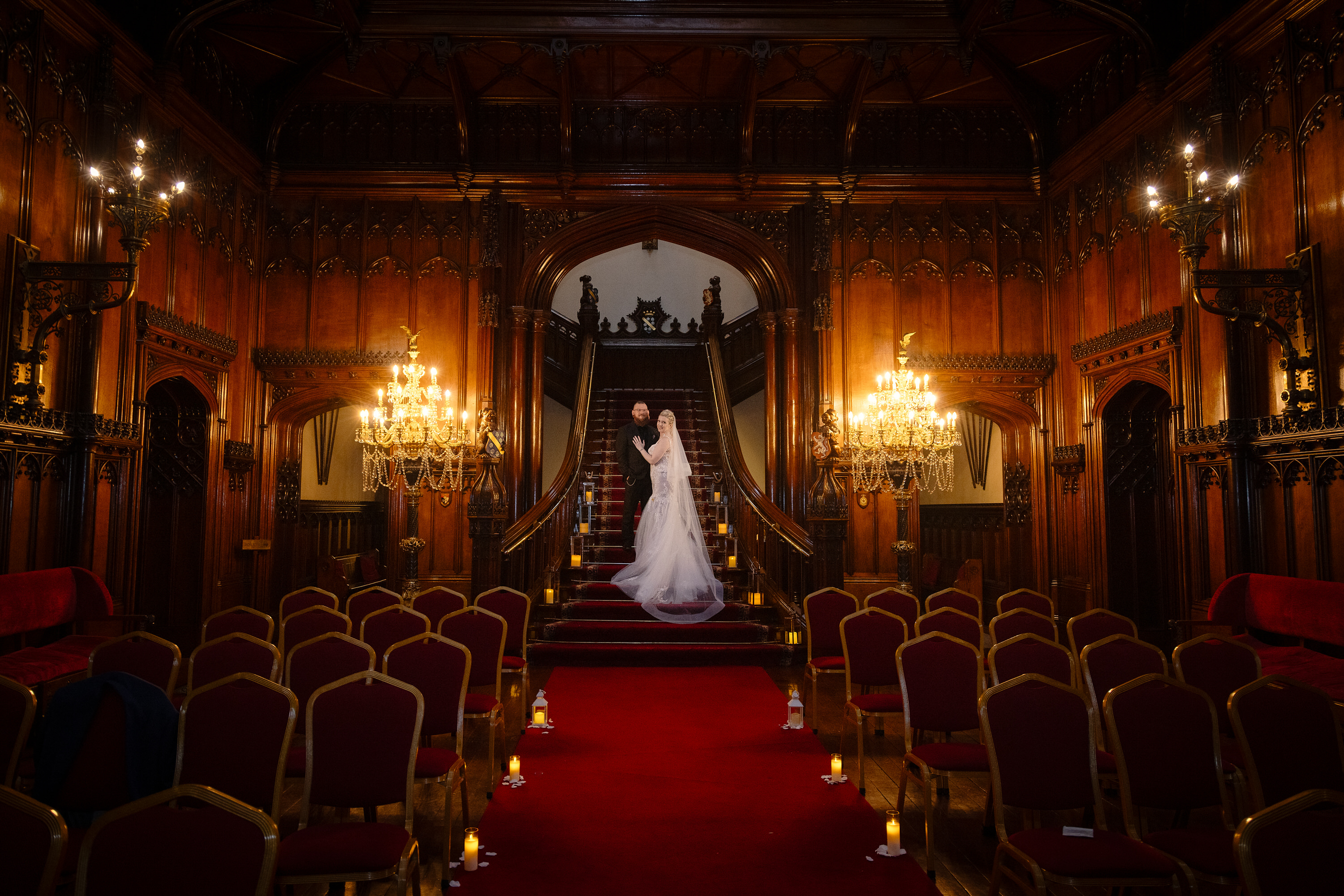 The bride and groom posed for their wedding photos at Allerton Castle 
