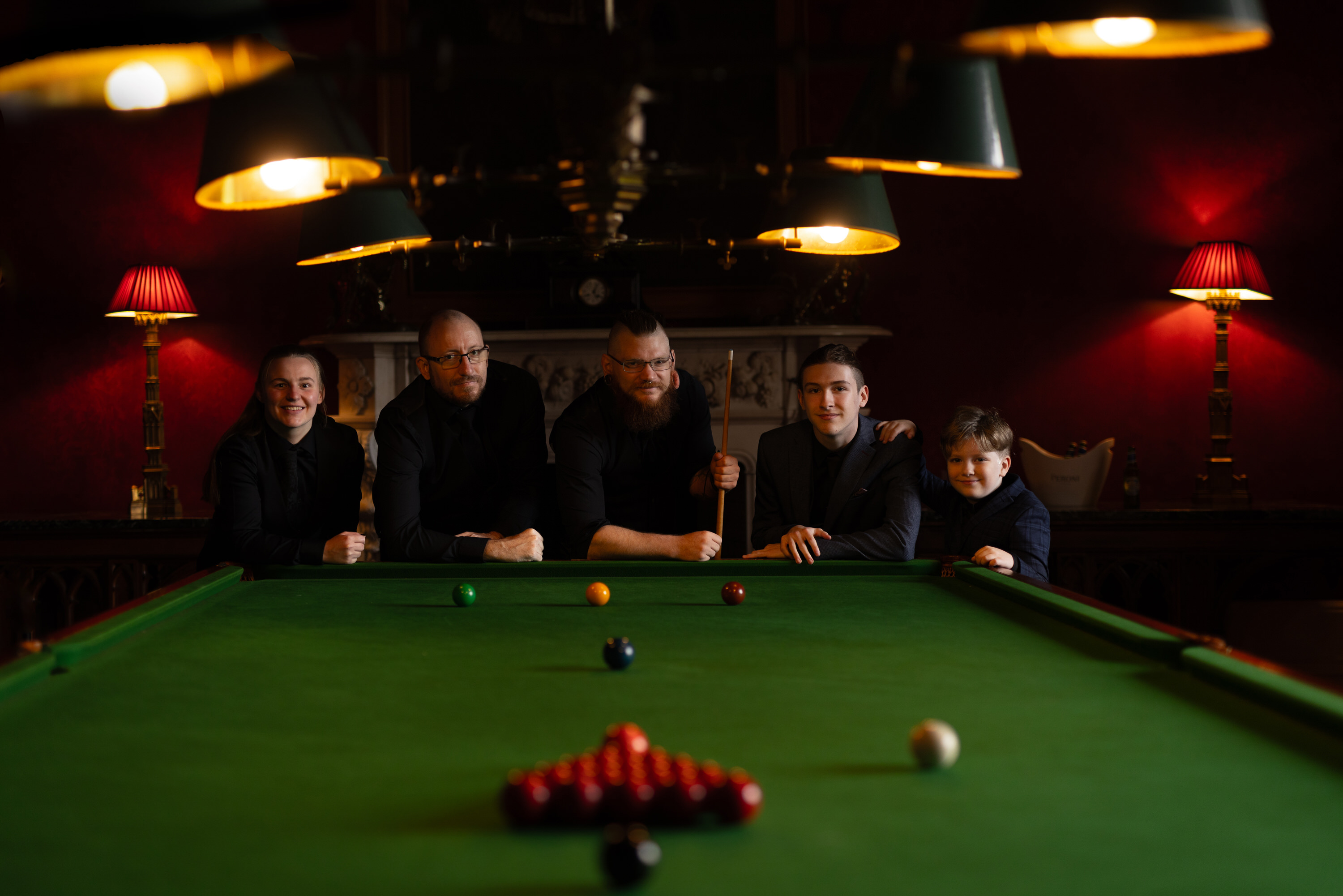 The groom best man and Sons playing snooker 