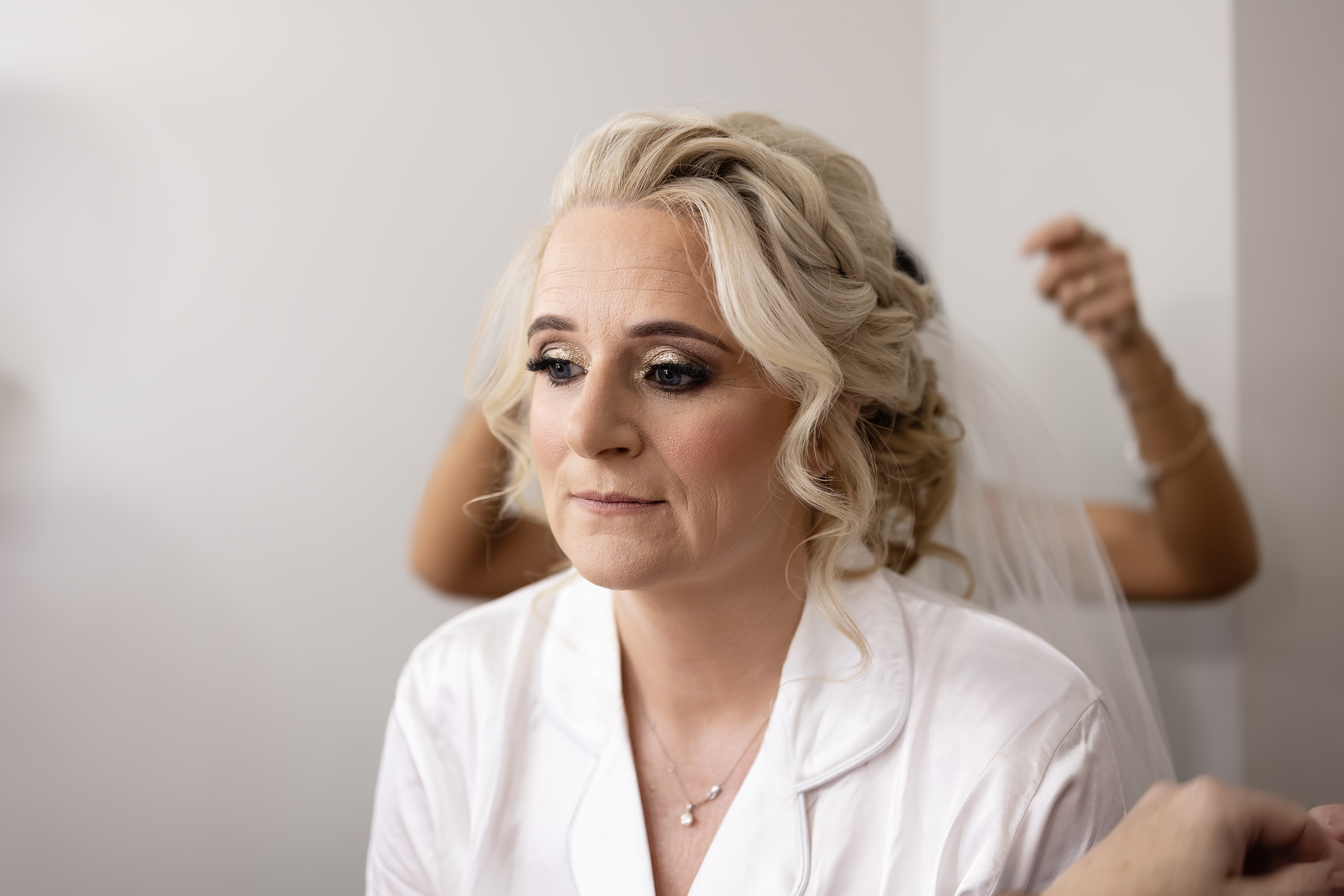 The bride having her hair made up