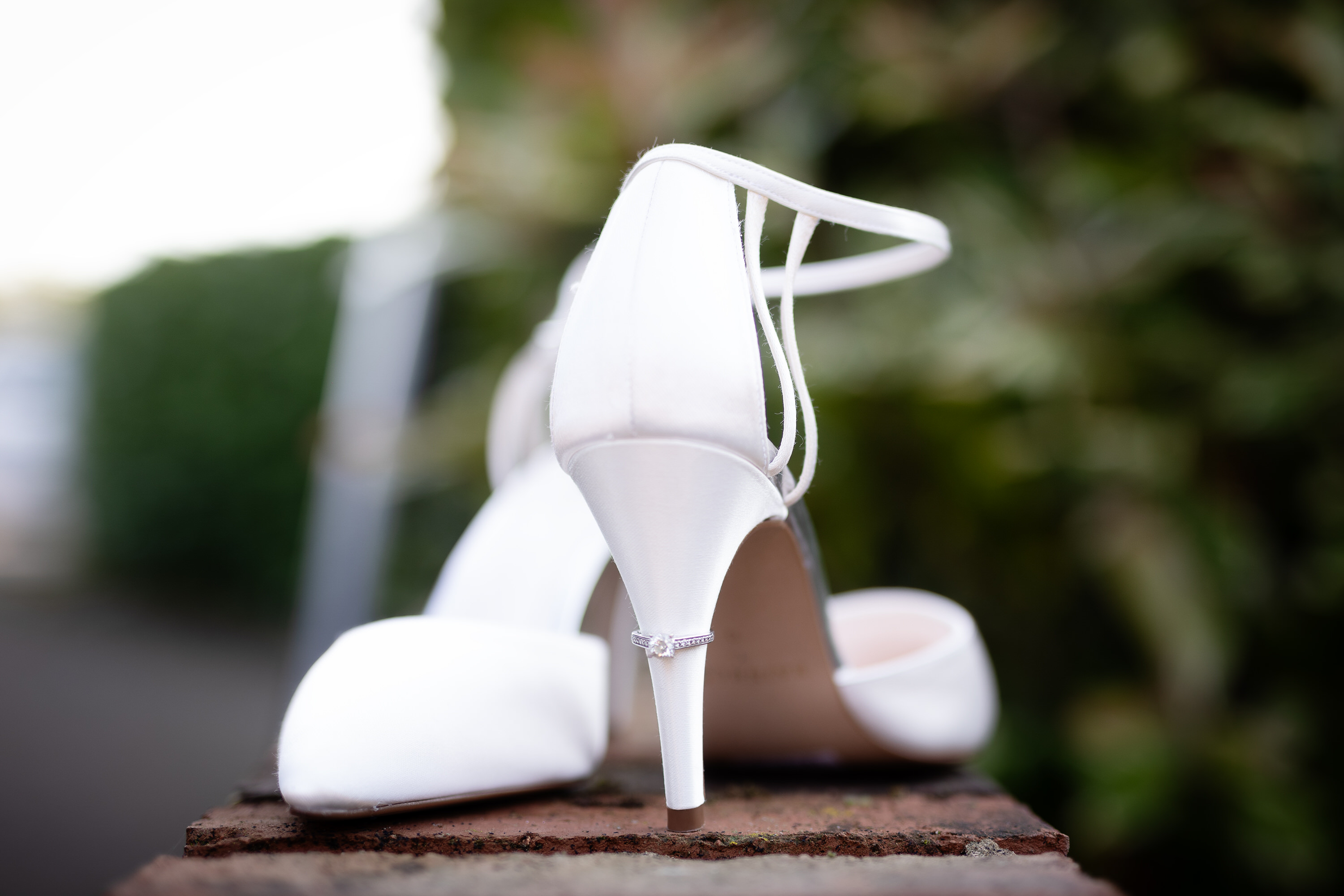 The Brides wedding shoes and her engagement ring 