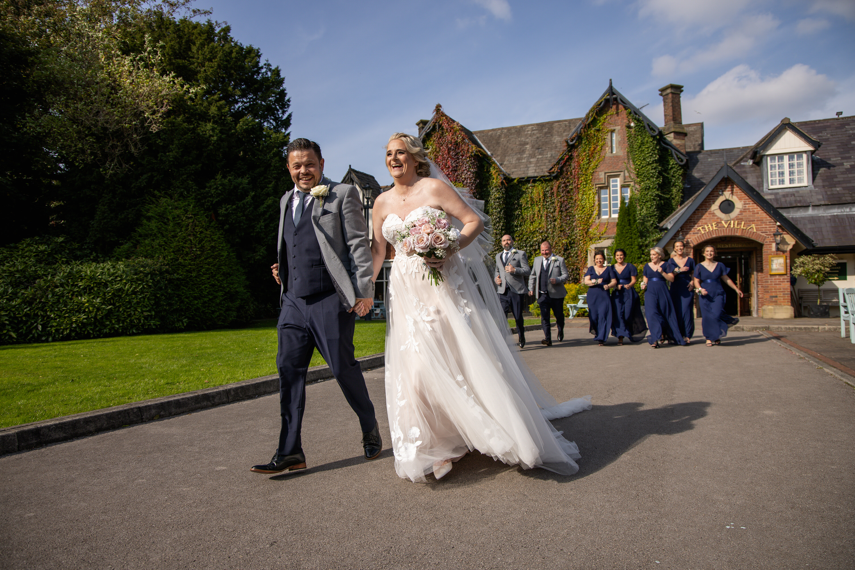 The bride and groom get chased by the bridesmaids 