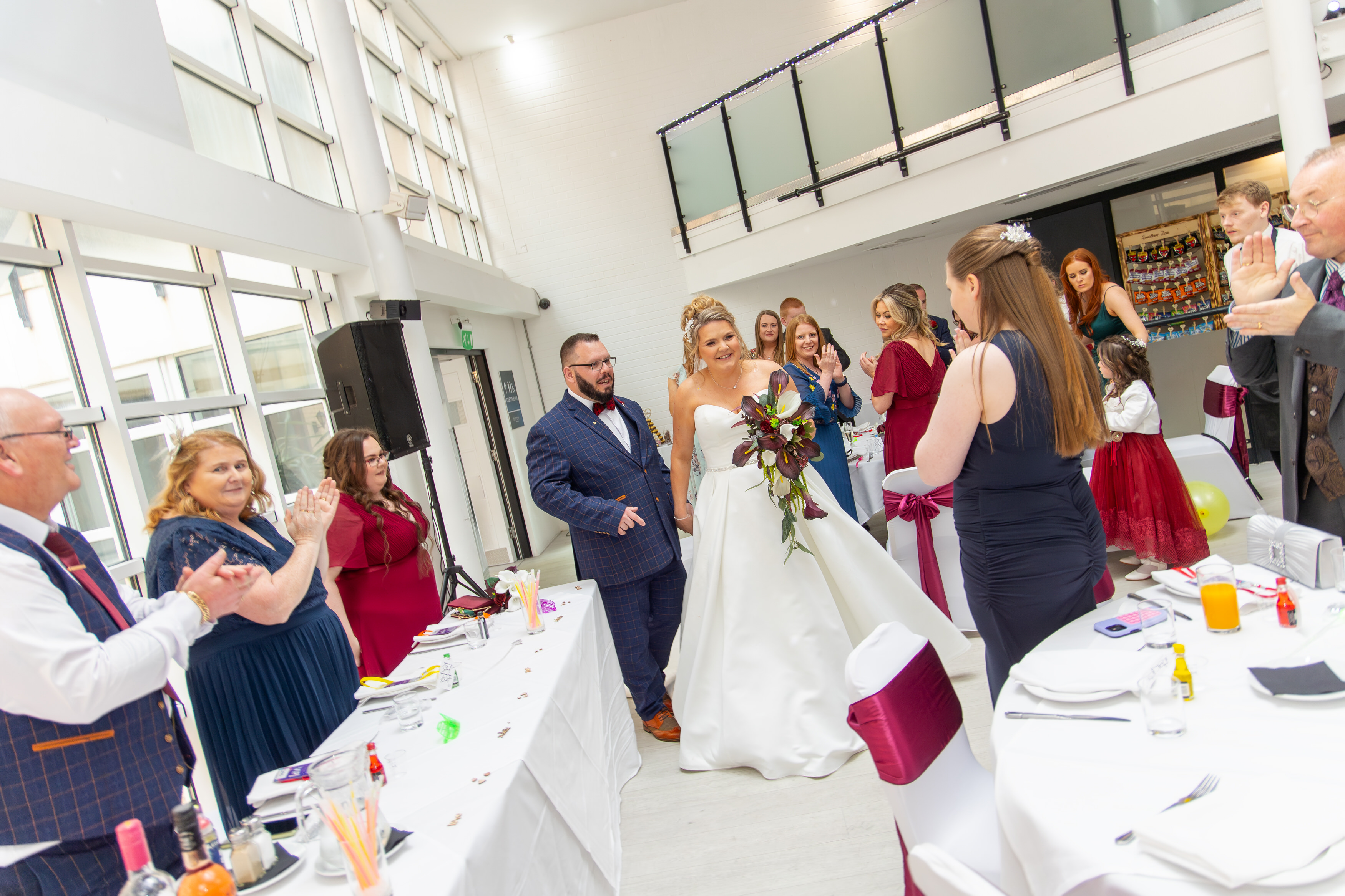 The Bride and  groom enter the reception room