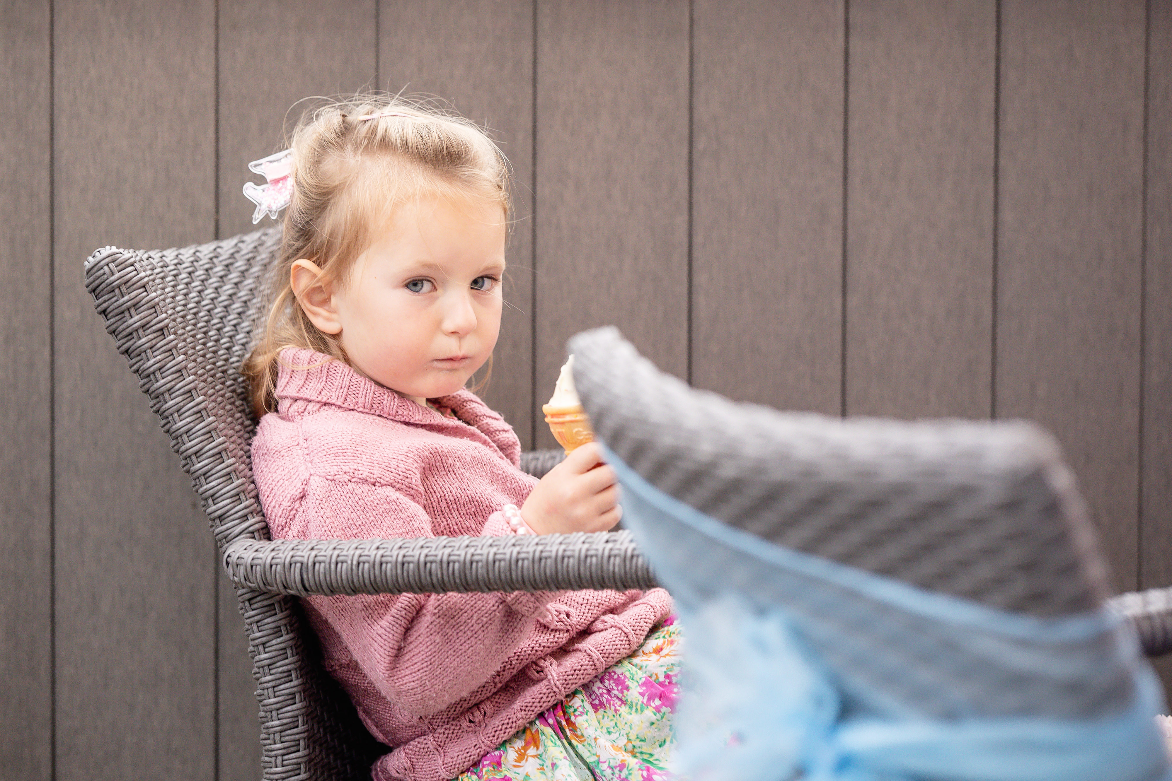 Little girl eating an ice cream 