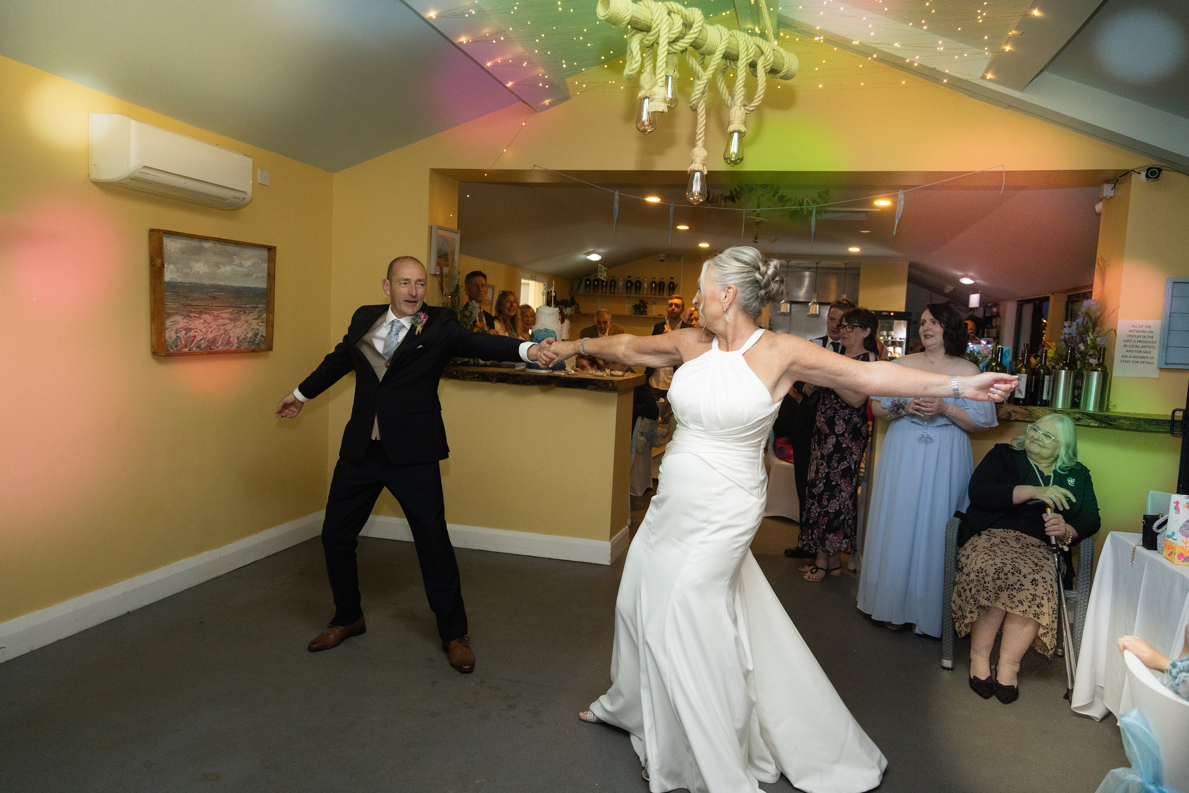 The bride and groom have their first dance 