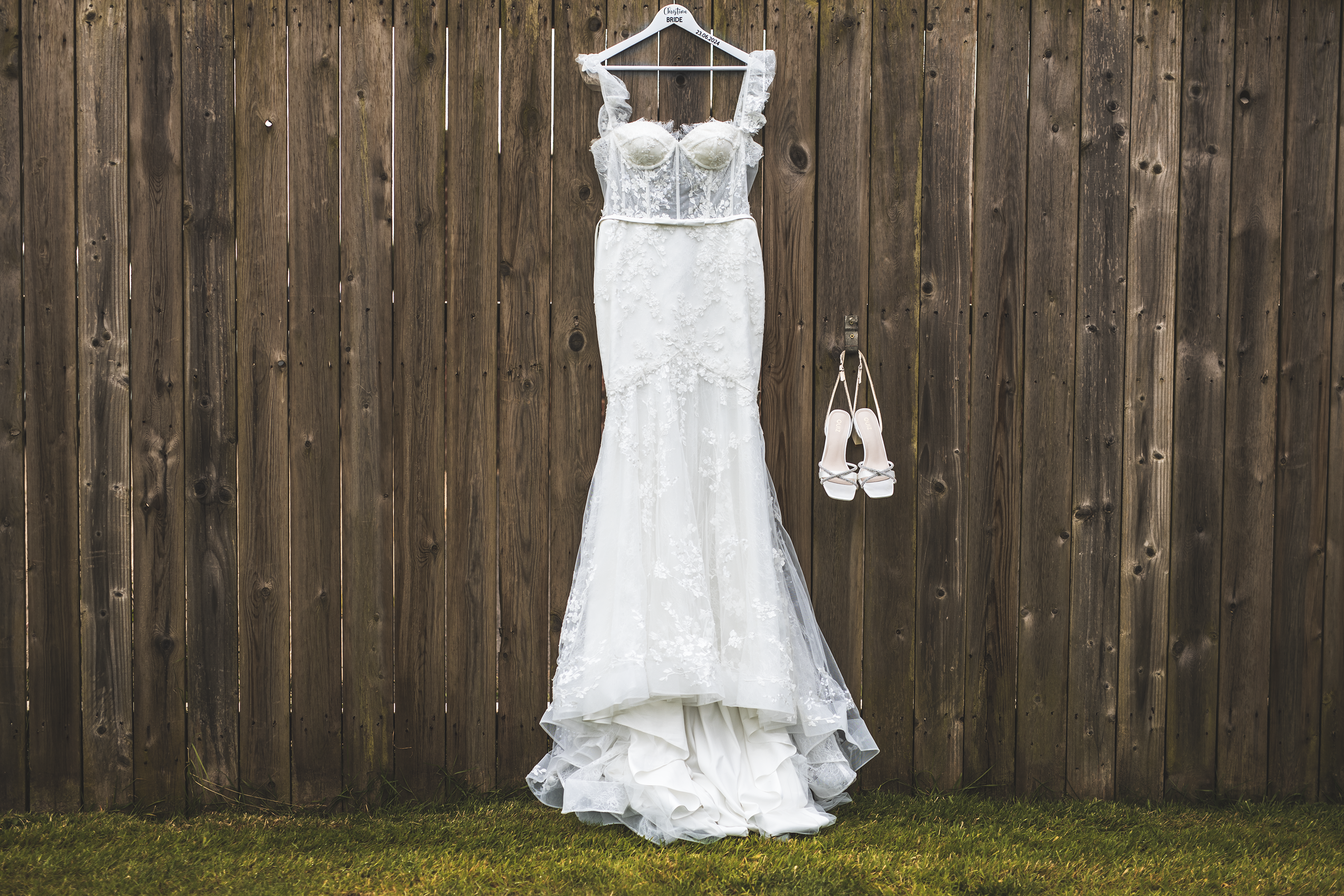 The bride's wedding dress and shoes