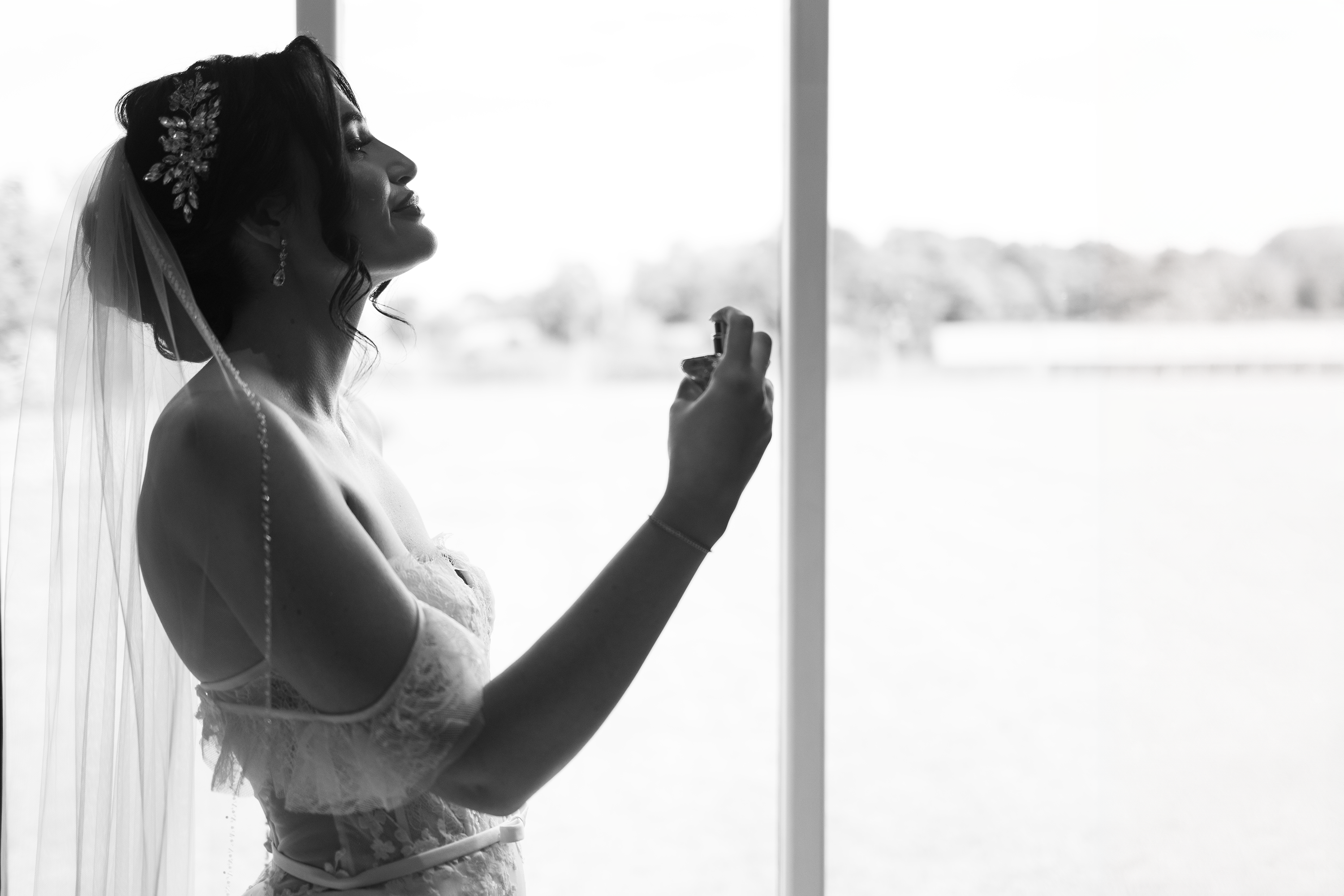 Christina the Bride putting on perfume 