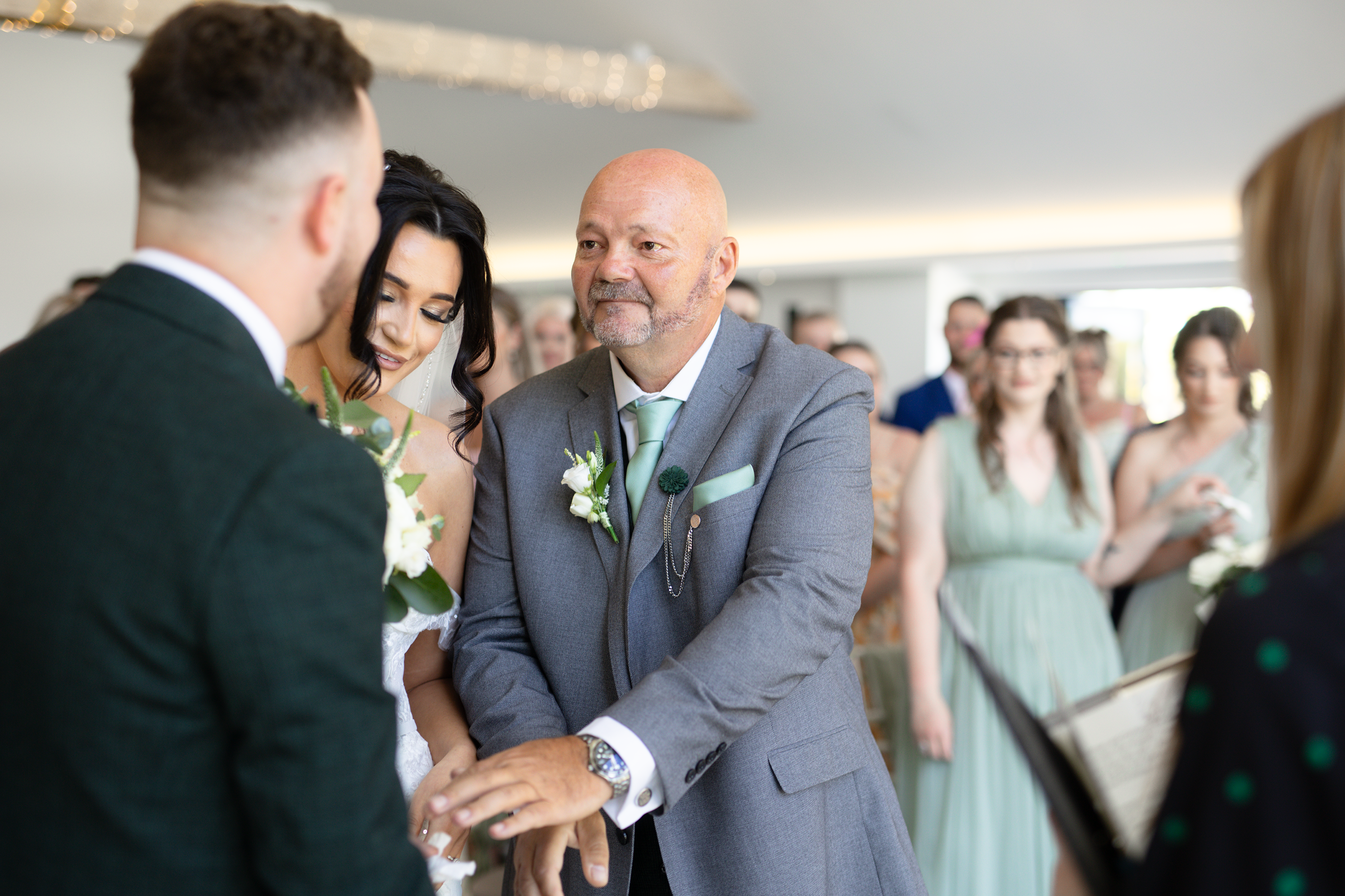 Christina's father hands over Christina to Nathan 
