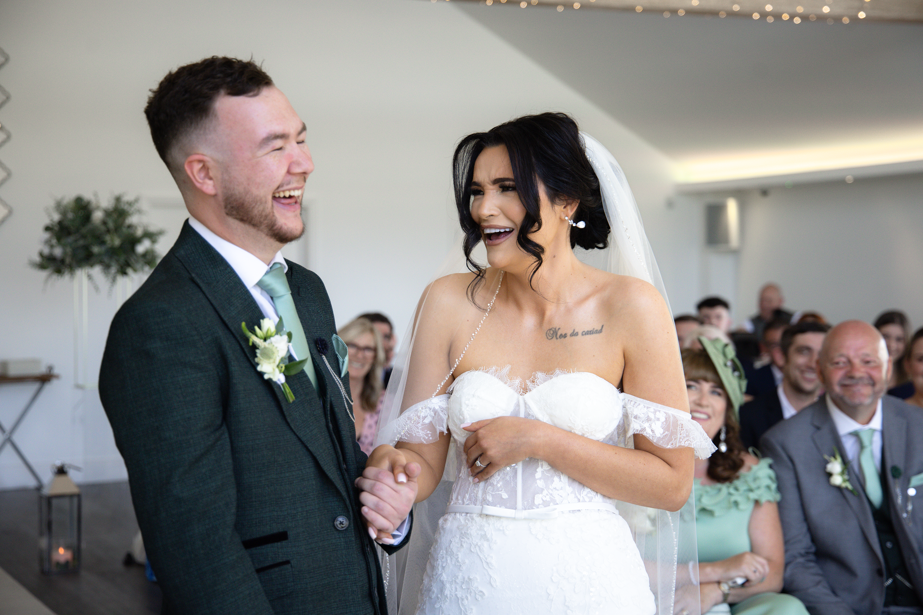 Christina and Nathan enjoying their wedding ceremony 