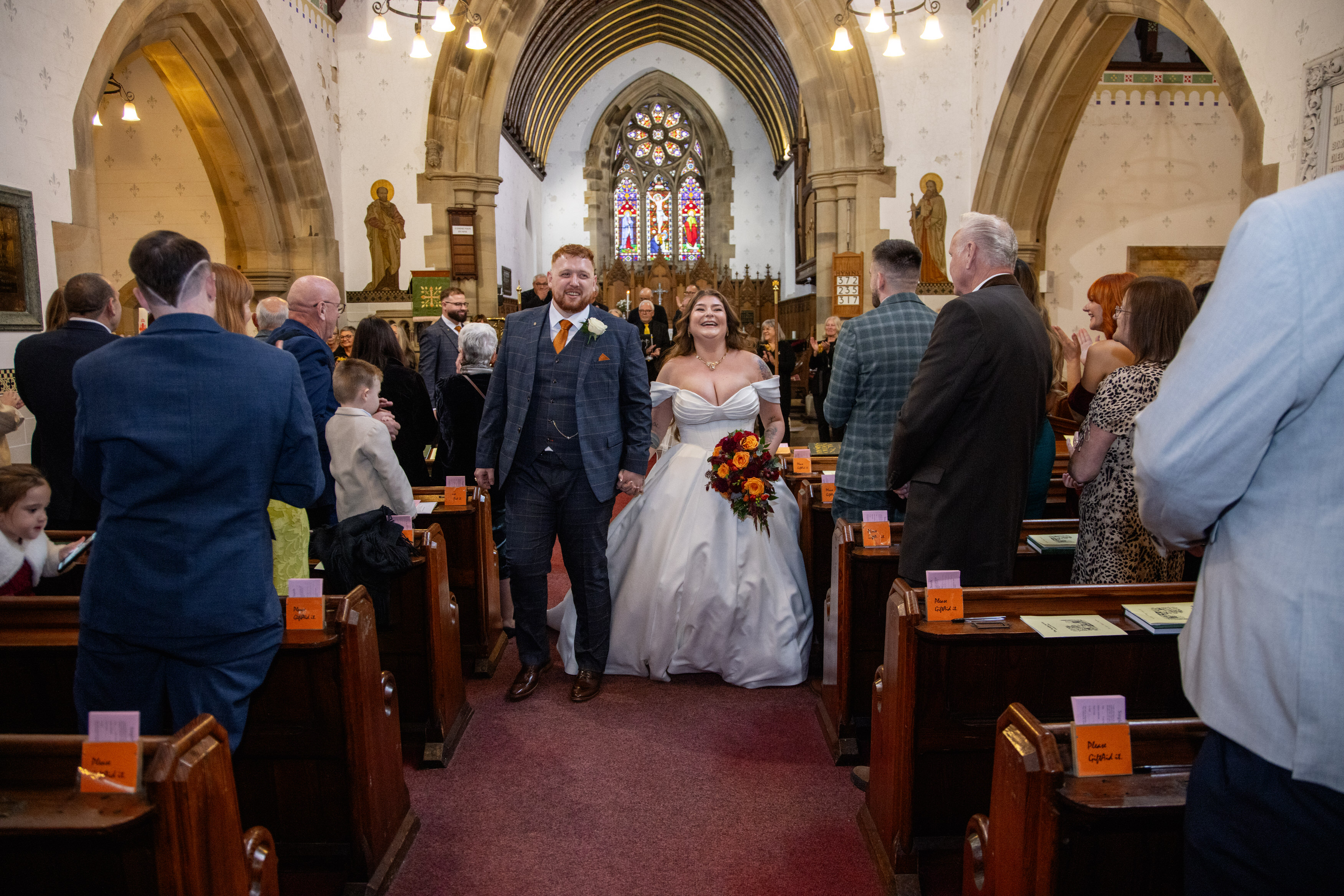 The happy couple walked down the aisle 