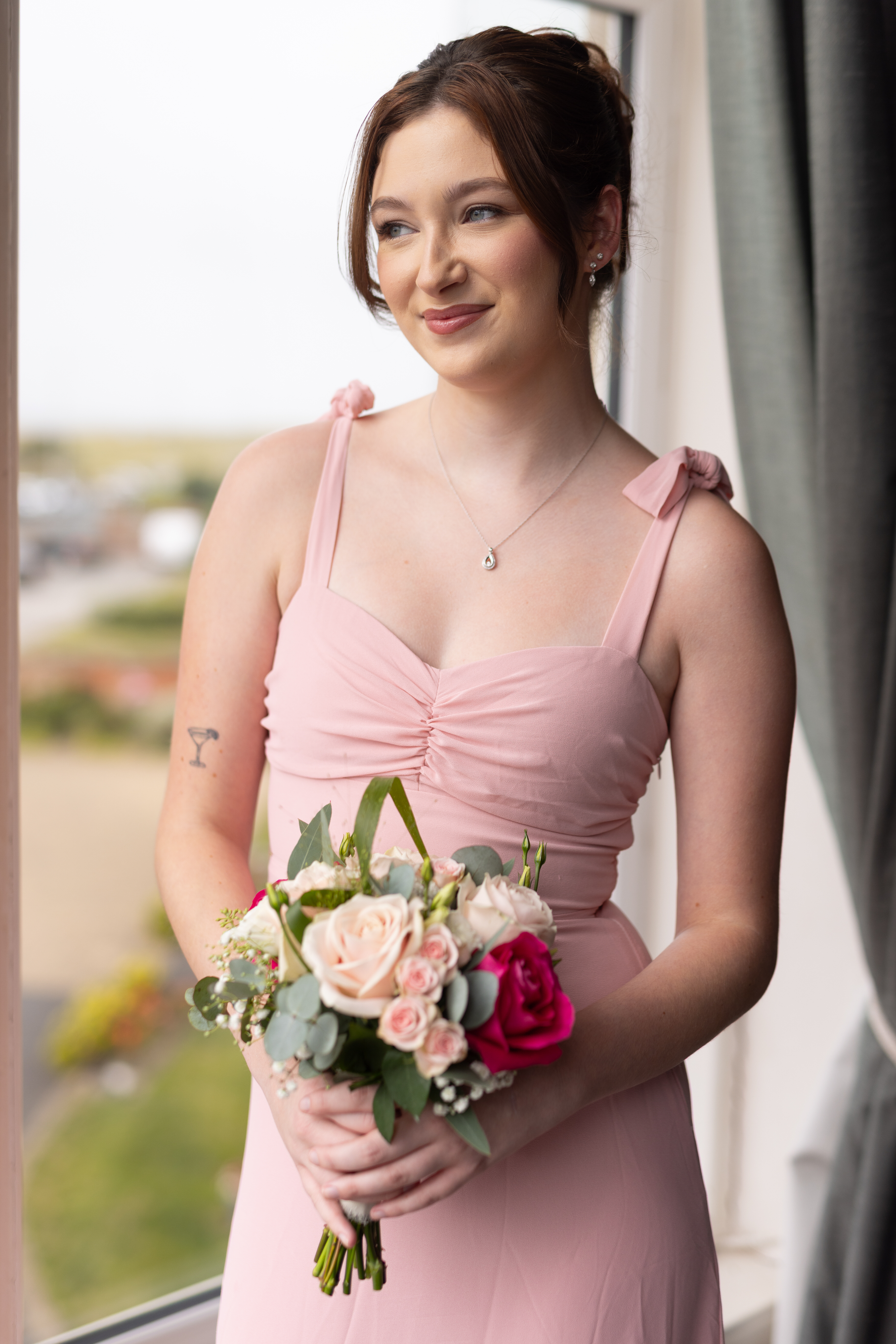 The brides maid  having her portrait taken
