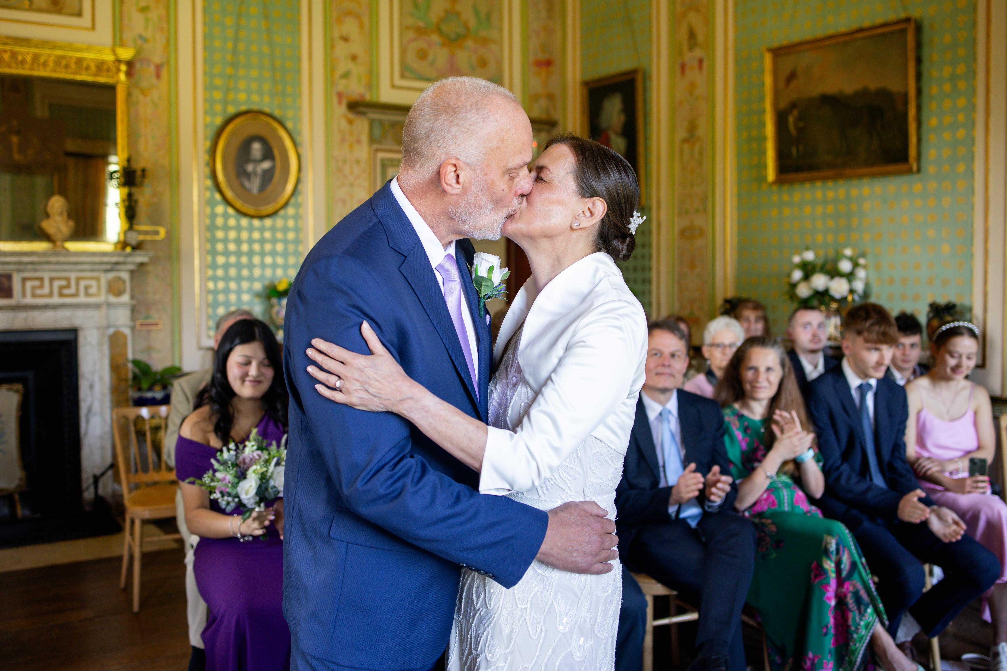Michael and Helen seal their wedding with the kiss 