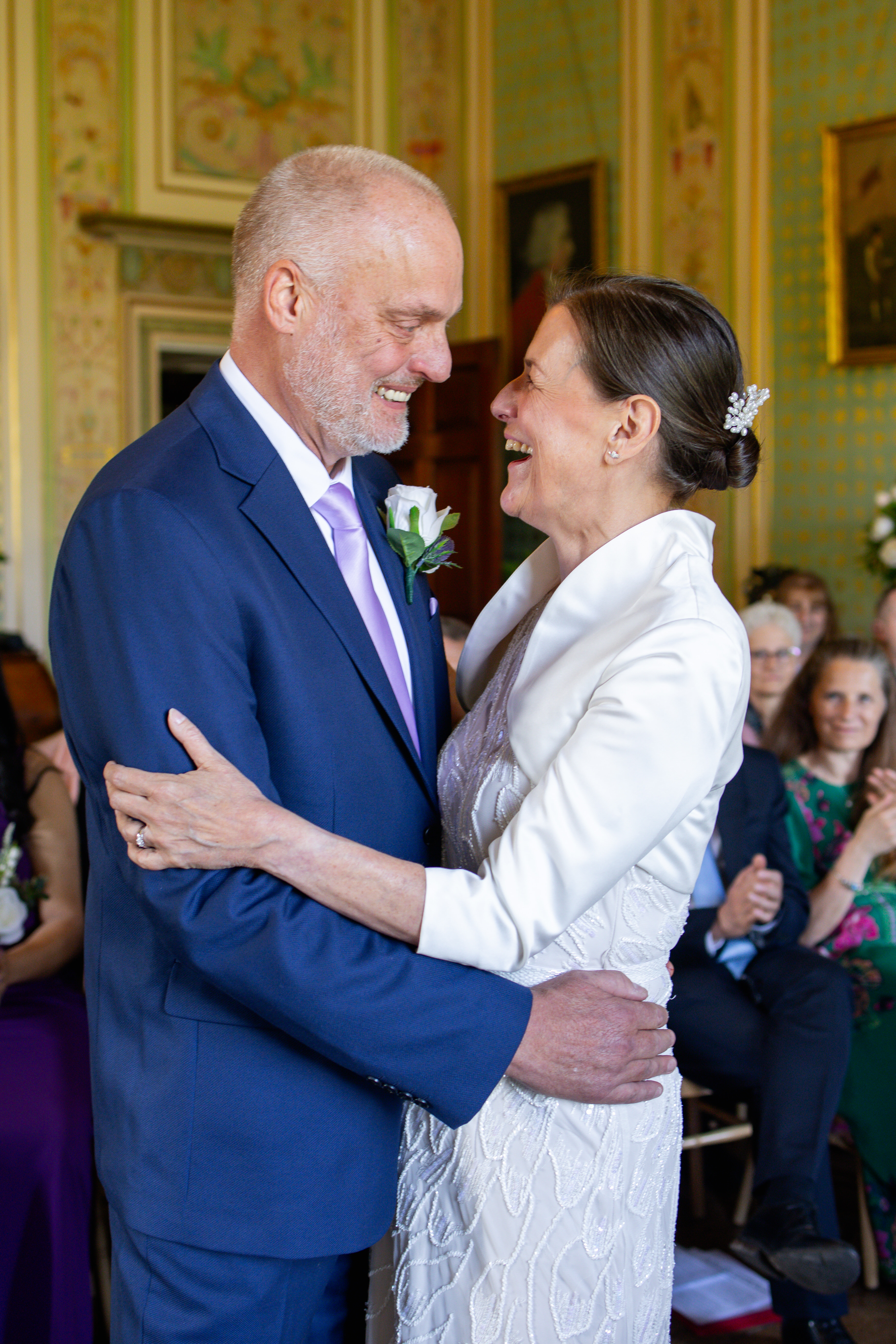 The happy couple laughed together on their wedding day 