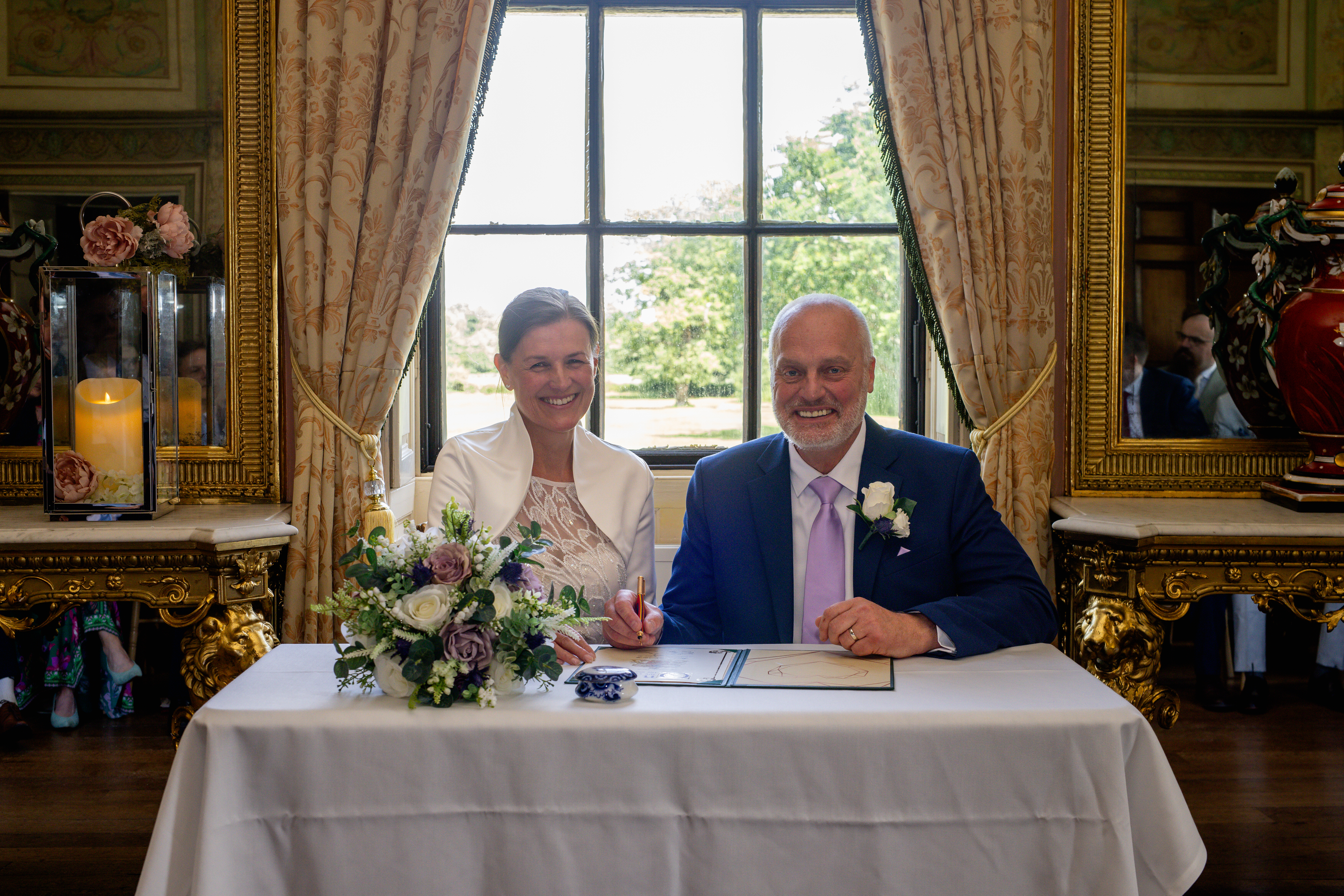 Helen and Michael signed the wedding register 