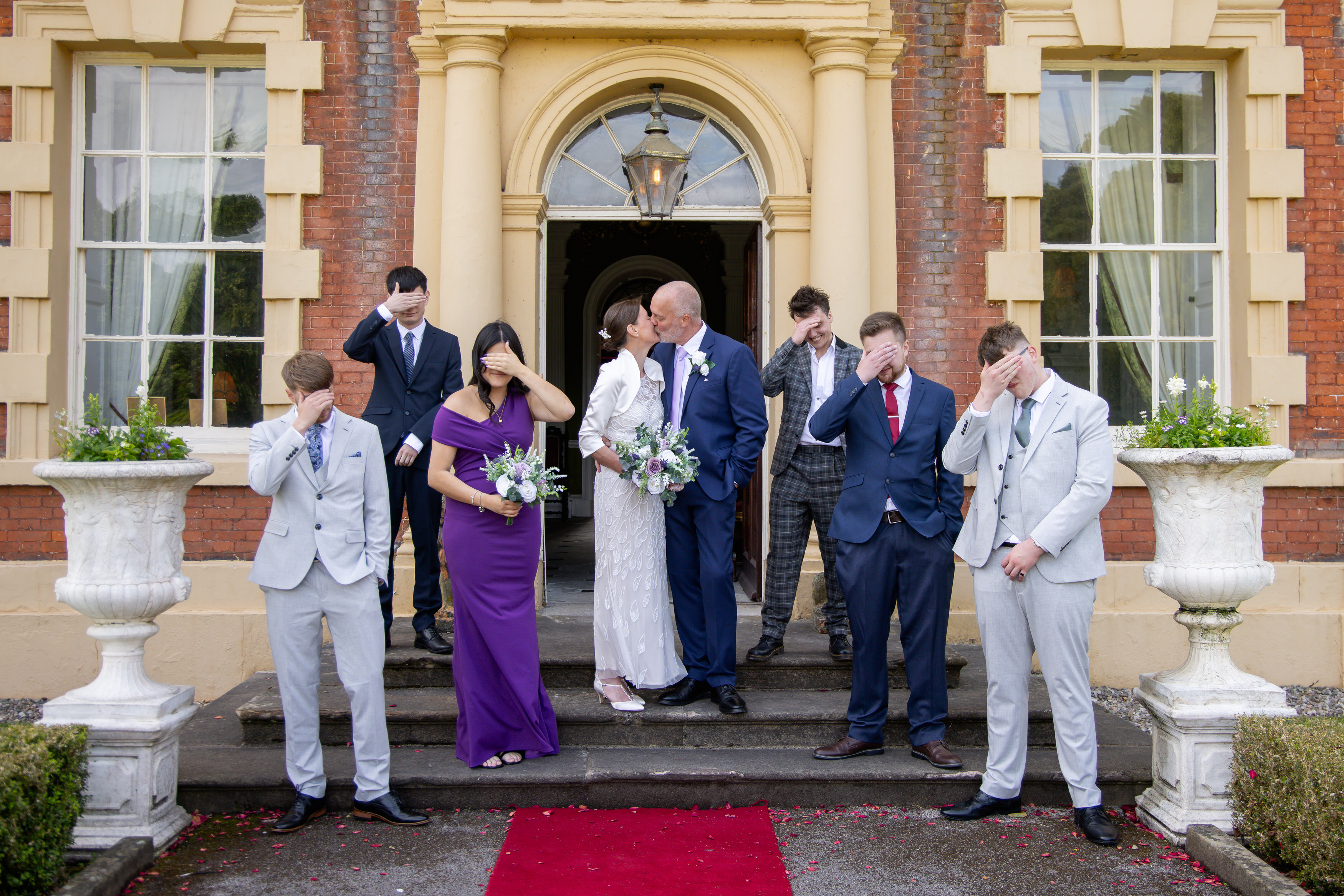 The bride and groom with their children 