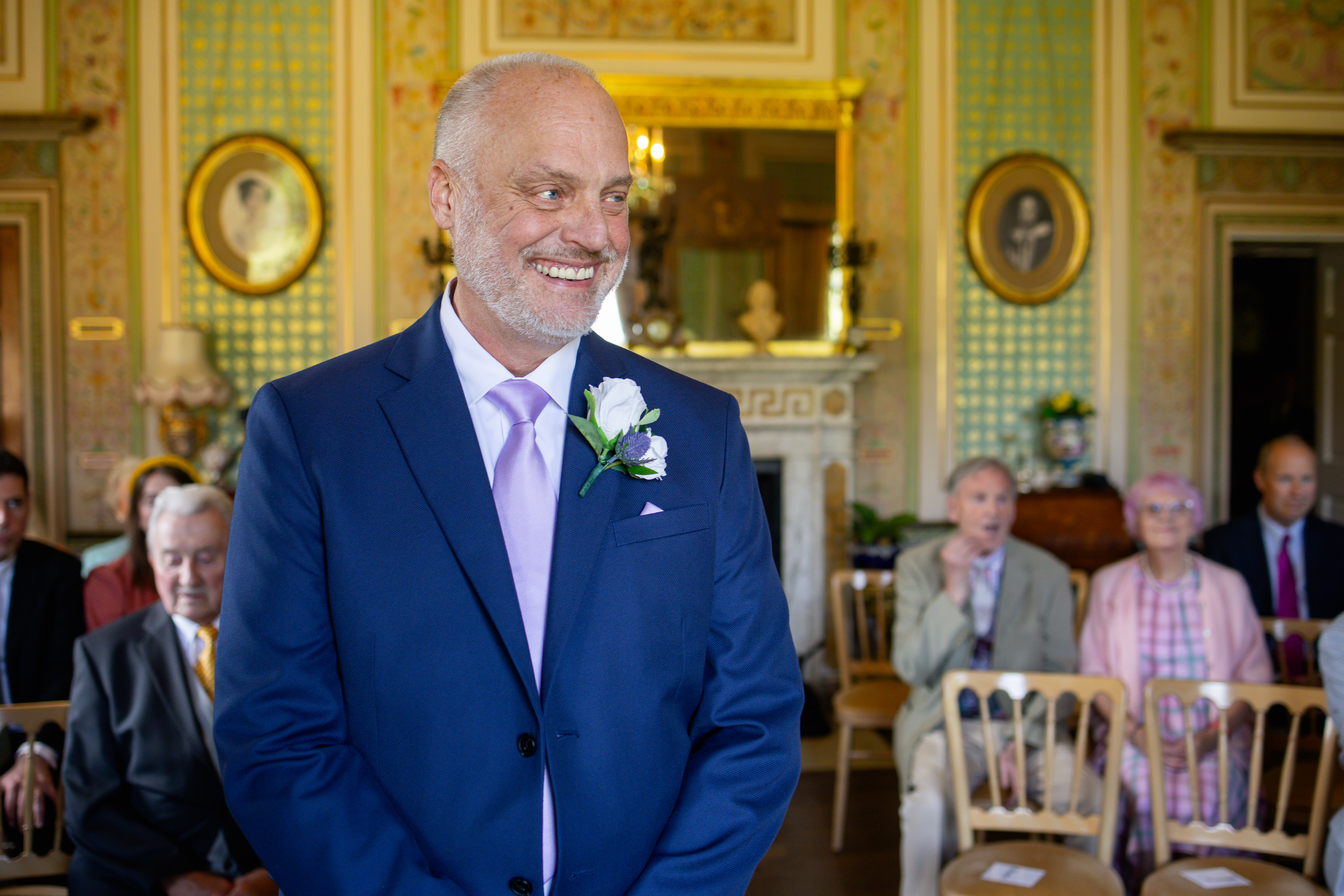 The groom Michael waiting for his bride to arrive 