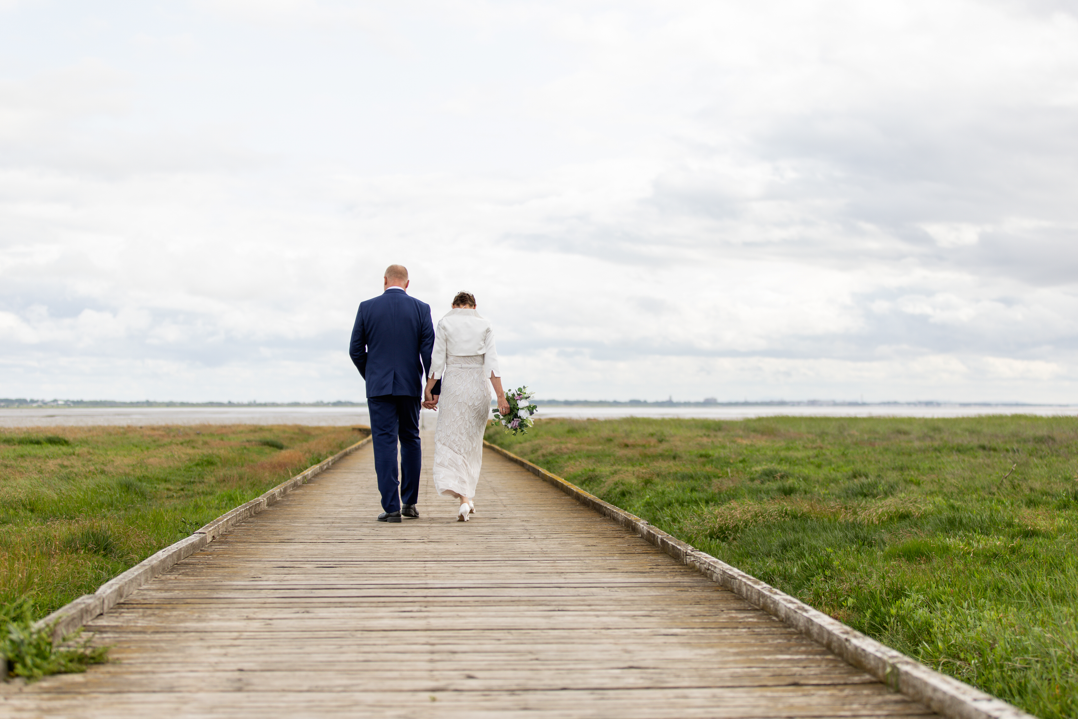 The bride and groom walked down Lytham Jetty