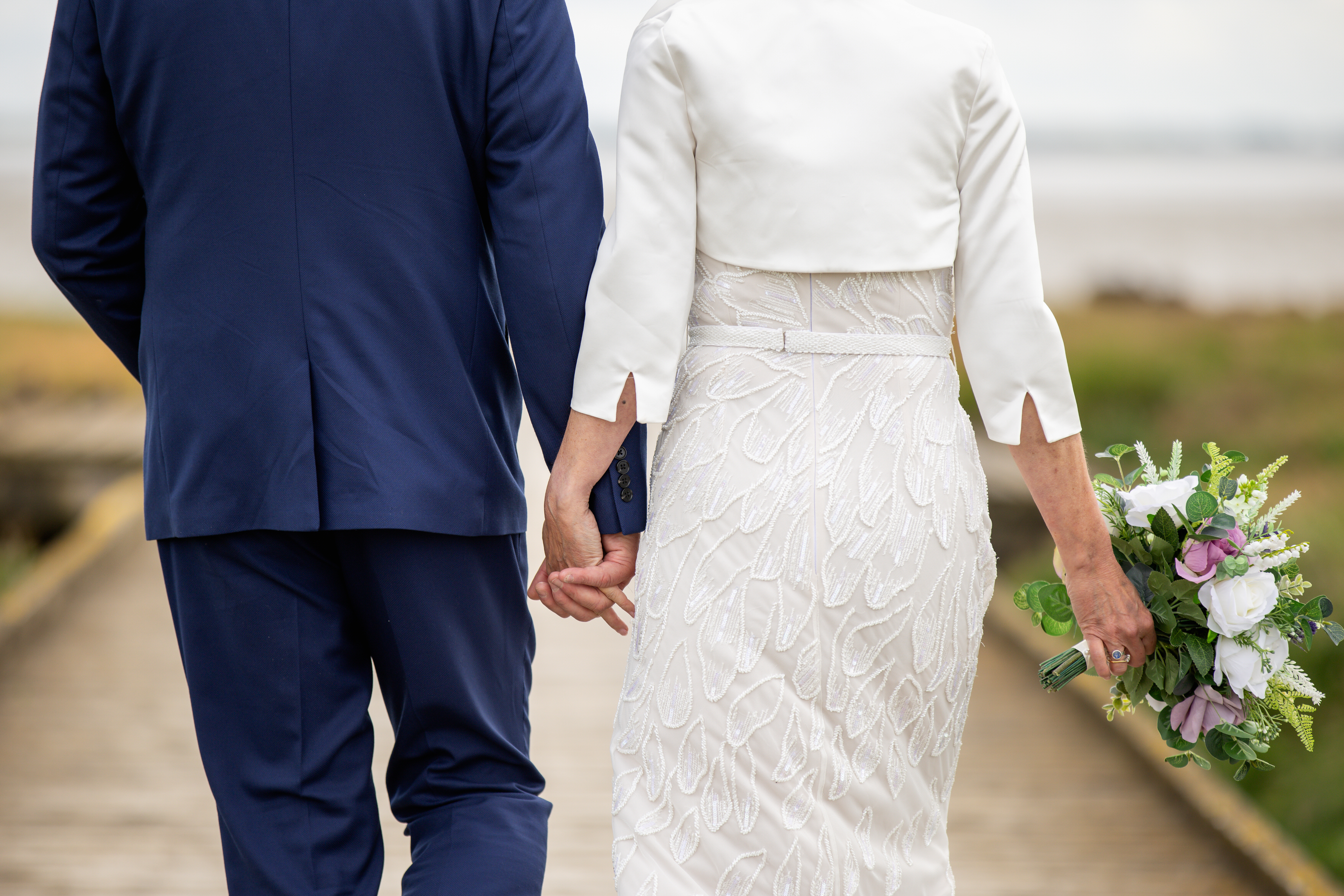 The bride and groom walked down Lytham Jetty