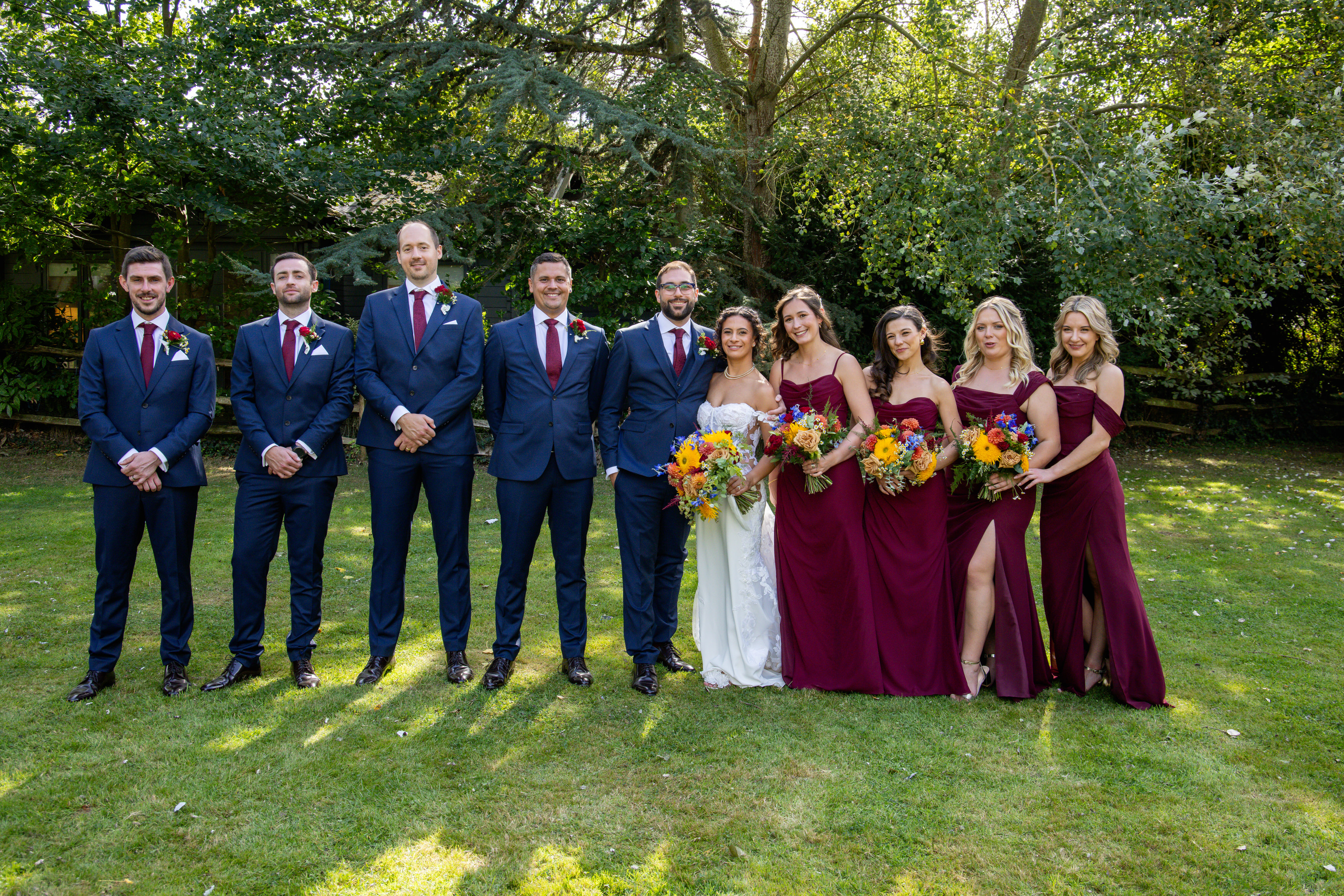 The bride and groom with the groomsman and bridesmaids 