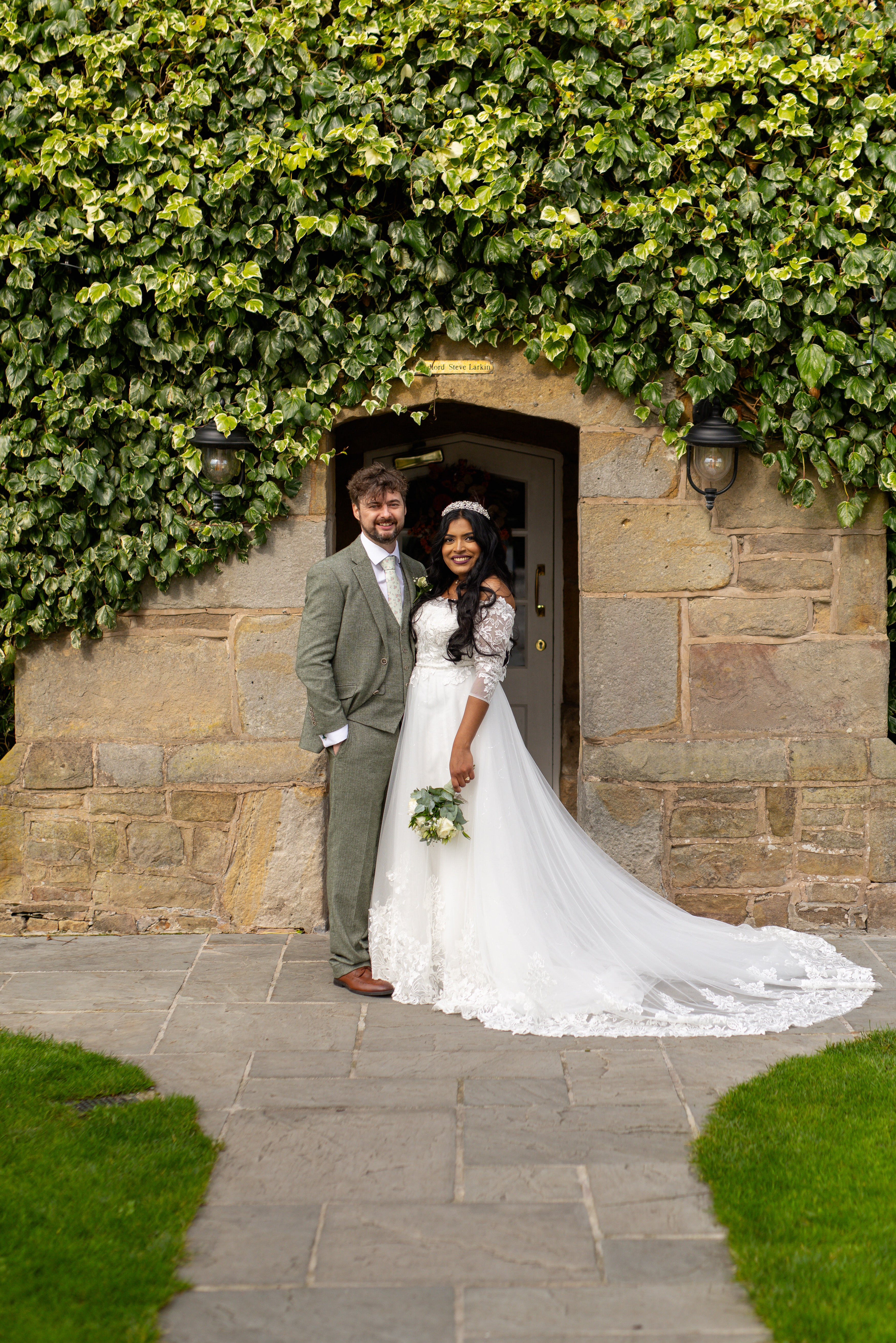 Tony and Udara pose for a photo in front of Haighton Manor