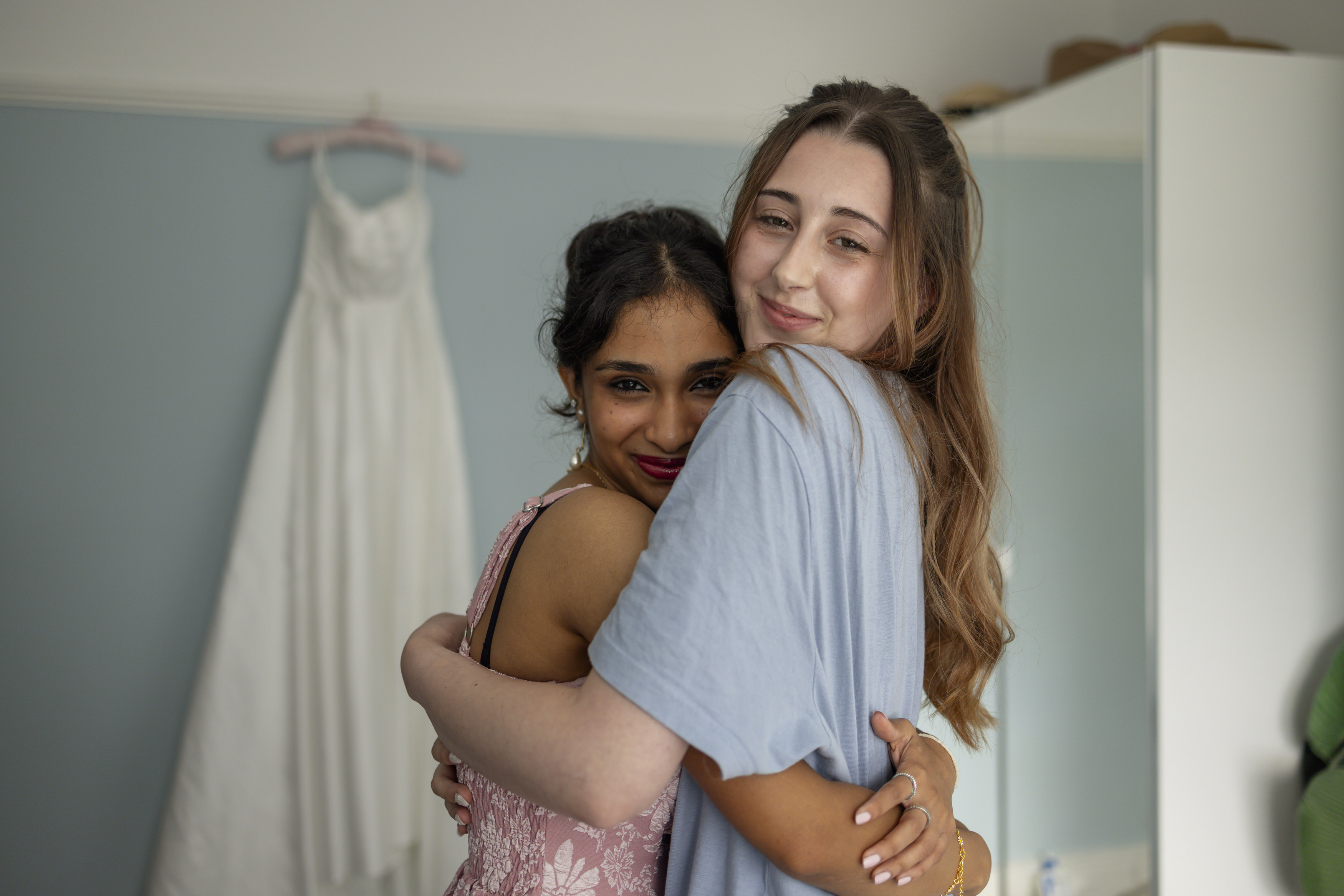 Katie and her bridesmaid having a hug 
