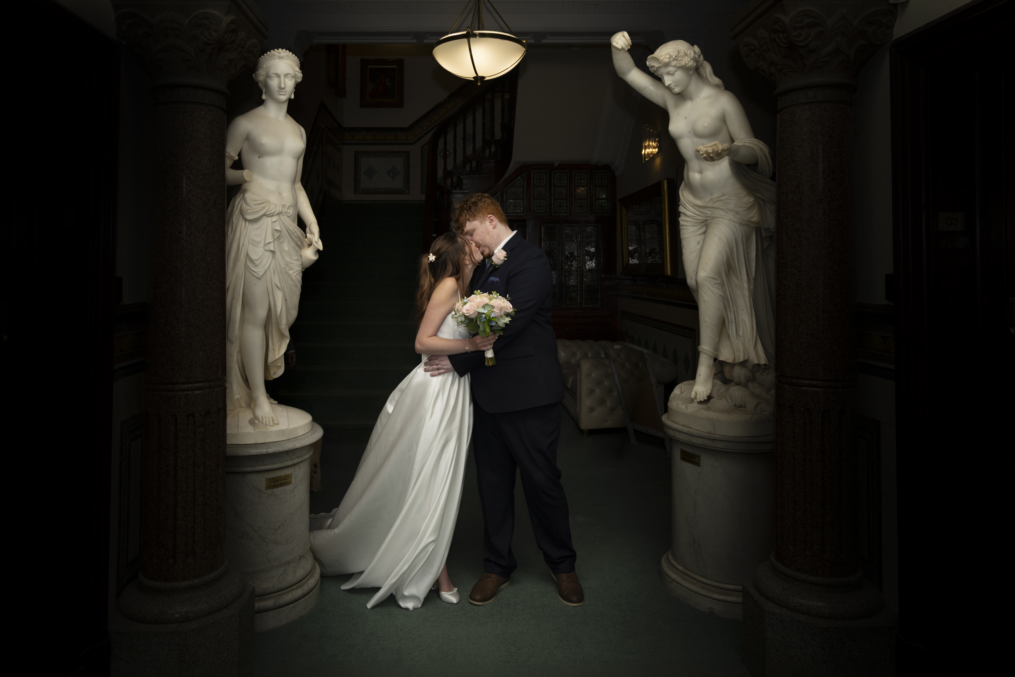 Ben and Katie pose for a photo in the hallway of The Fylde office building