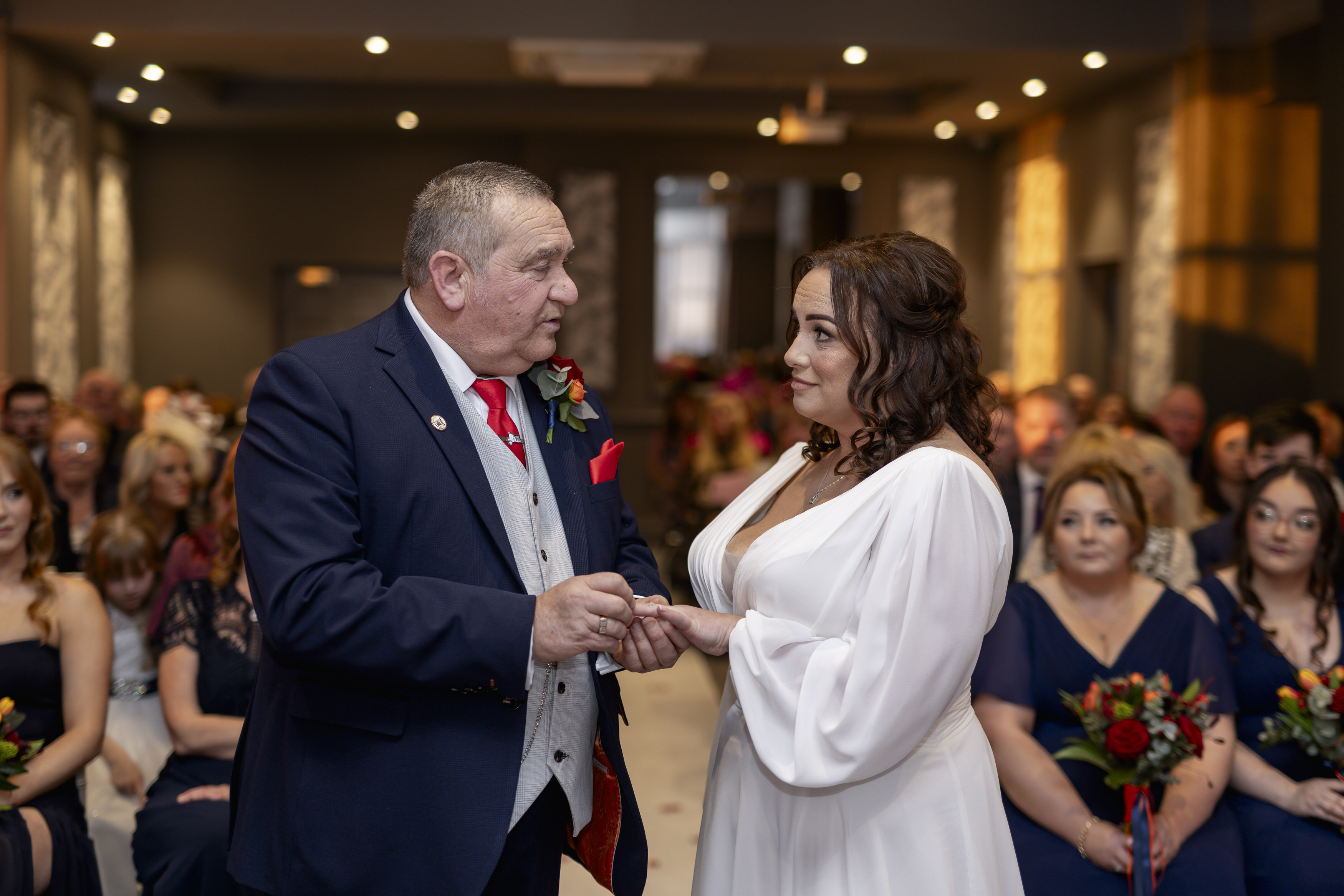Gary puts Claires wedding ring on her finger