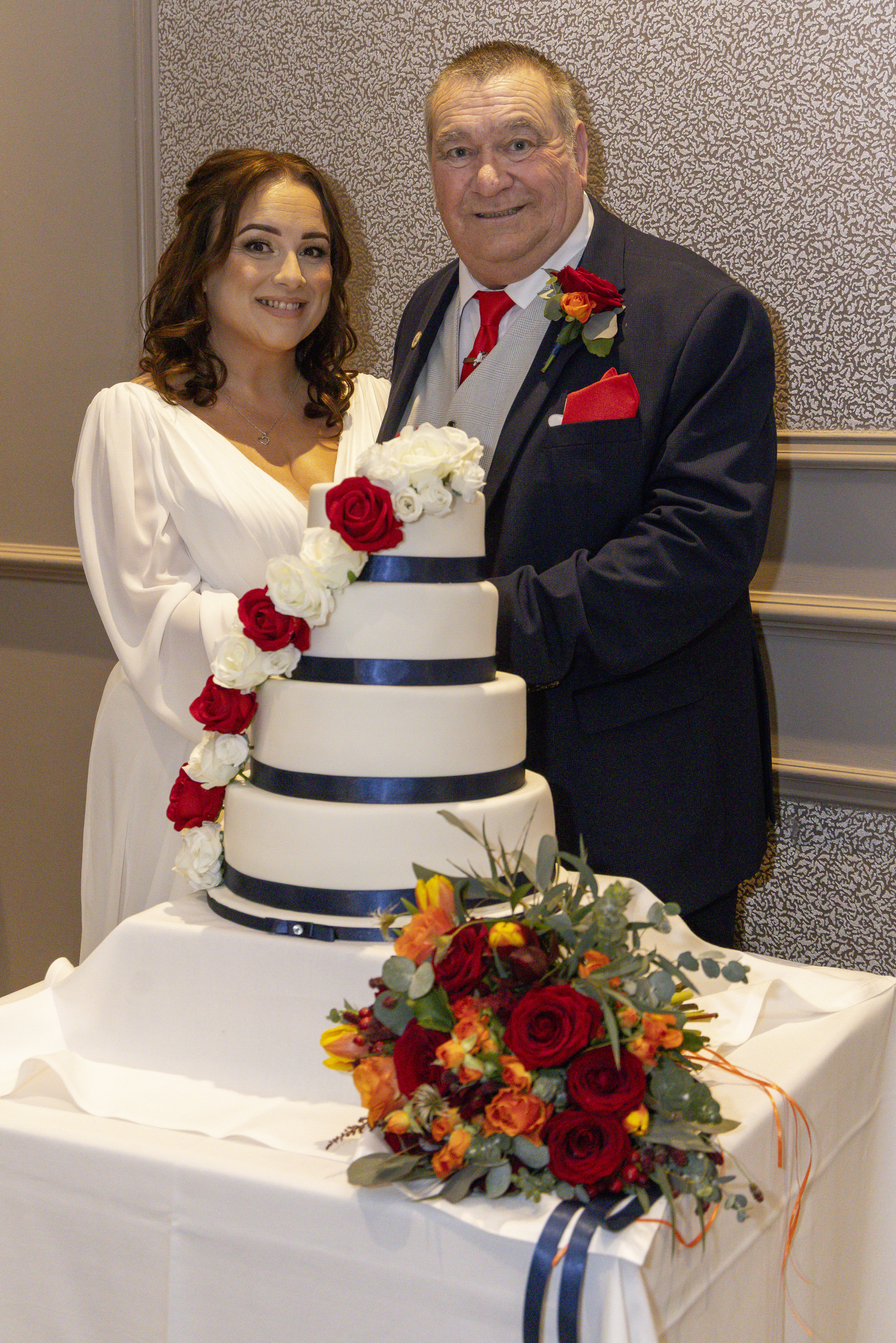 Gary and Claire cut their wedding cake 