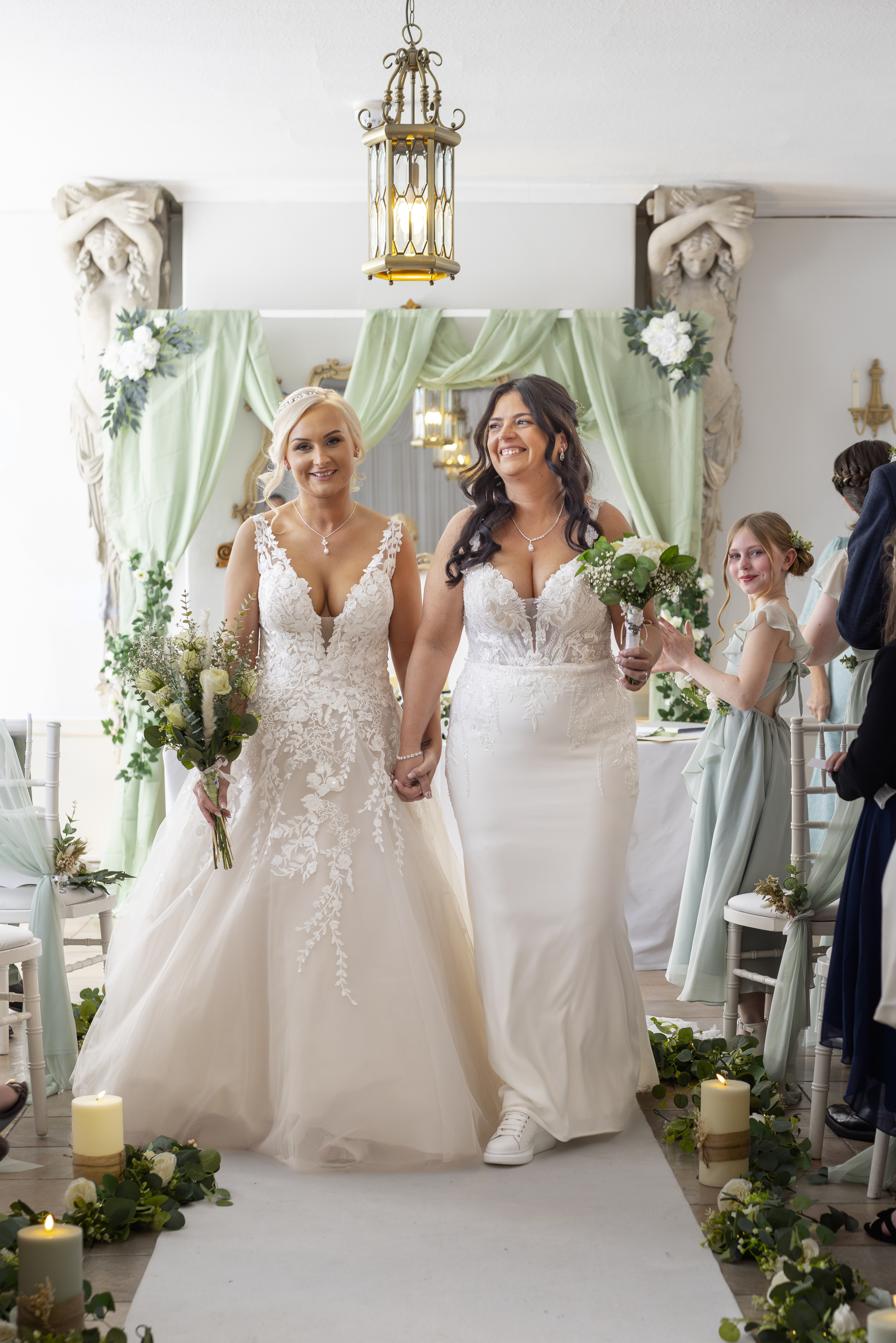 Hollie and Sophie walked down the aisle his wife and wife 